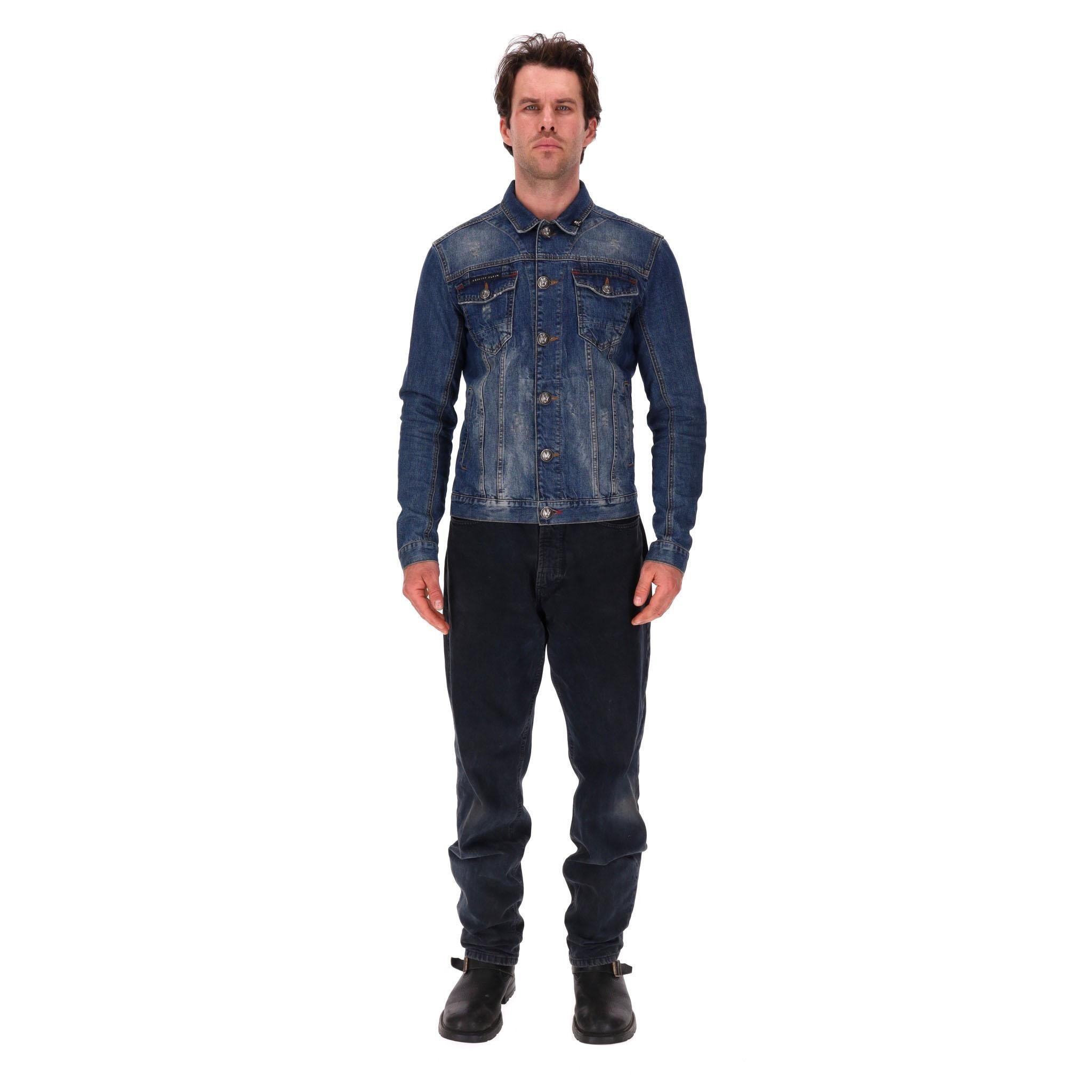 Philipp Plein Distressed Denim Jacket

Classic denim jacket with crafted from cotton with distressed effect.

Logo patch to rear, logo embossed ruthenium buttons and signature silver skull detailed leather tag to the collar.

Rrp Approx.