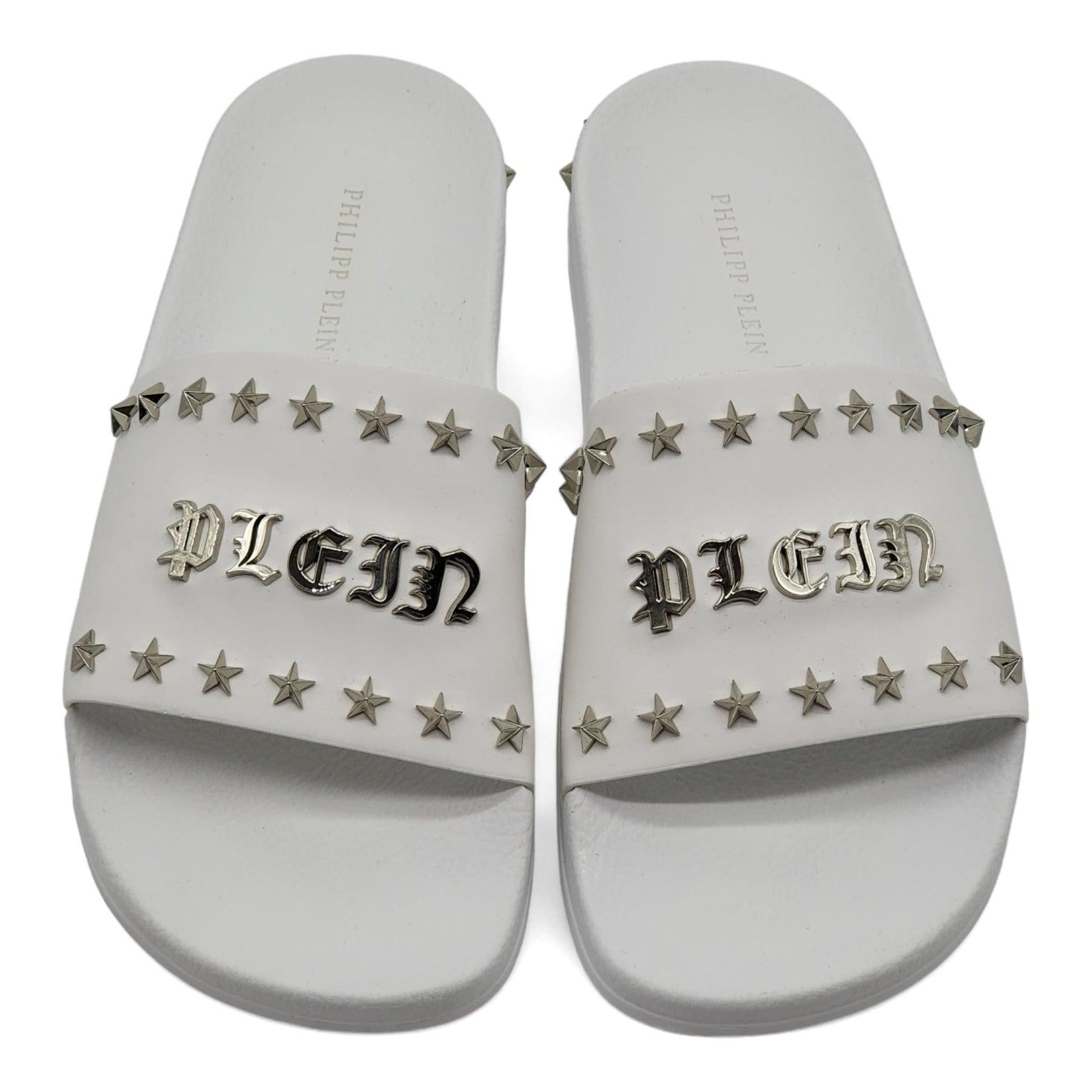 Philipp Plein Gothic Plein studded slides. 

Gothic Plein stud-studded sandals from PHILIPP PLEIN featuring jet black, stud embellishment, open toe and flat rubber sole.

Additional information:
Material: Rubber
Style: FABS-USG0021-PLE008N 
Color: