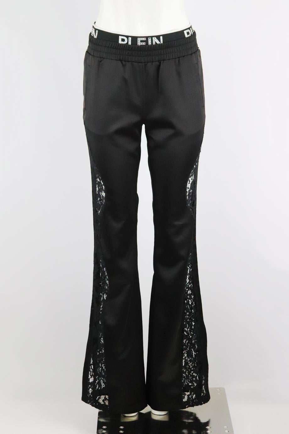 Philipp Plein lace trimmed satin wide leg pants. Black and white. Pull on. 97% Polyester, 3% spandex; fabric2: 100% polyester; fabric3: 80% polyester, 20% elastane; lining: 67% acetate, 33% polyester. Size: Medium (UK 10, US 6, FR 38, IT 42). Waist: