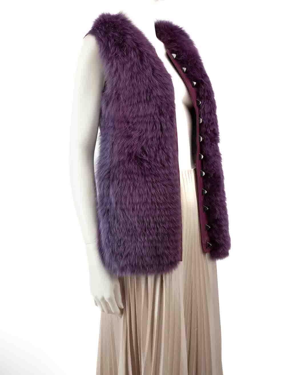 CONDITION is Very good. Minimal wear to vest is evident. Minimal wear to the embroidery detailing with a handful of plucked threads found on this used Philipp Plein designer resale item.
 
 
 
 Details
 
 
 Purple
 
 Leather
 
 Vest
 
 Front fox fur