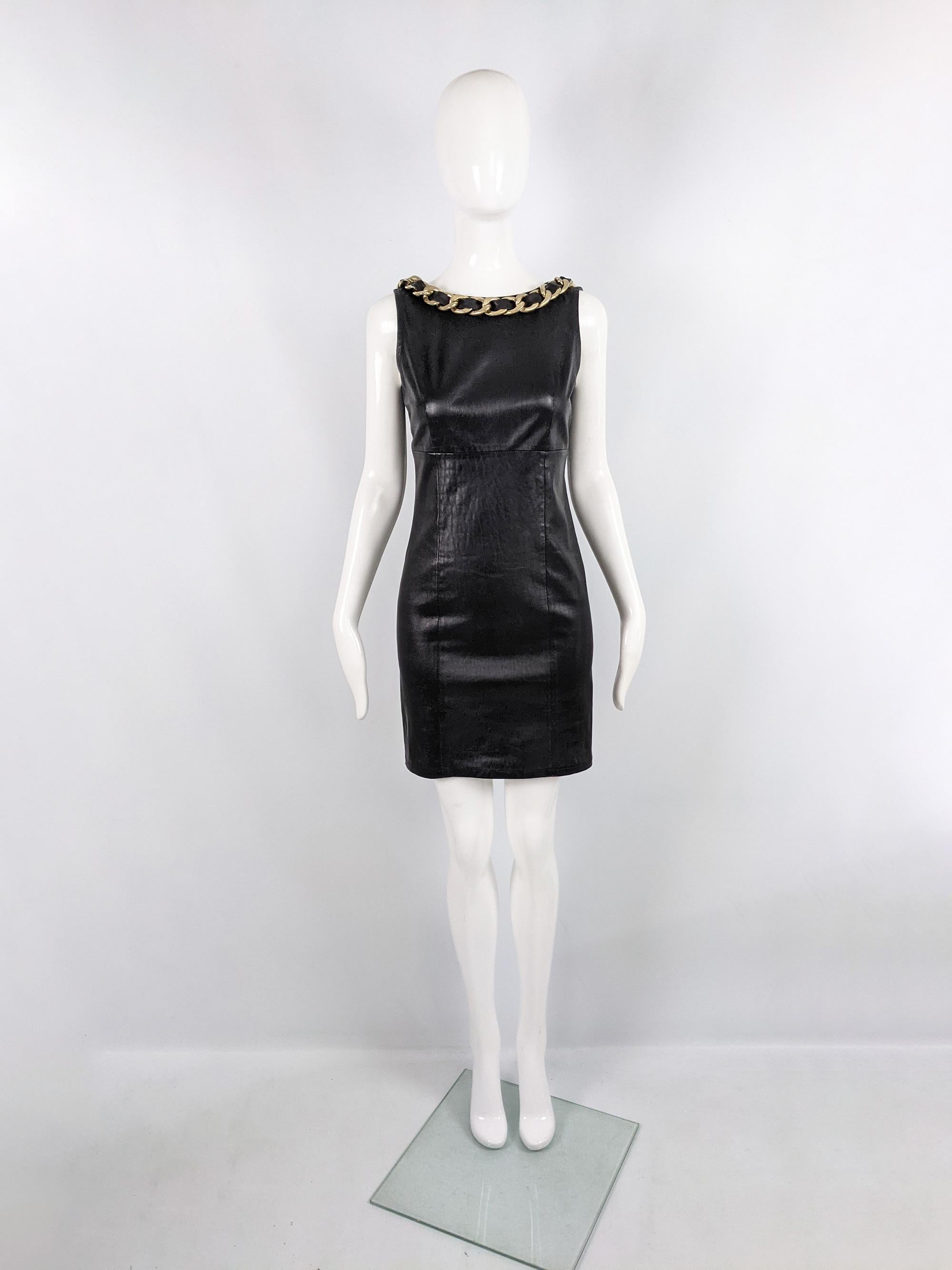 A sexy and glamorous preowned Philipp Plein sleeveless mini cocktail dress. Made in Italy, in a black leather with a heavy gold coloured chain with leather interlaced though it. With a deep backless design, perfect for a party. 

Size: Marked M and