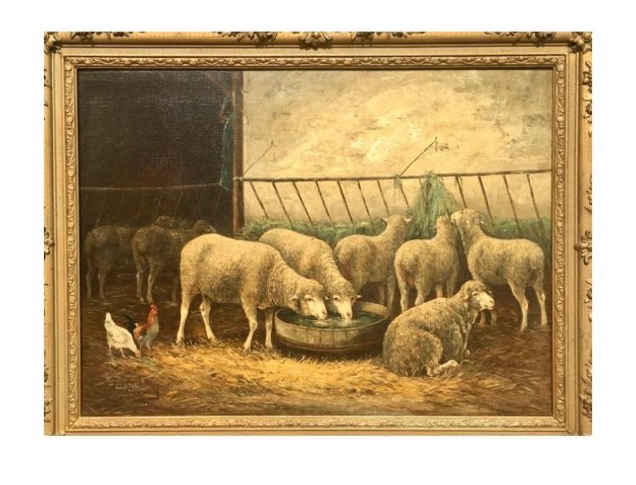 Huile sur toile représentant des moutons dans l'étable. Signé en bas à gauche 