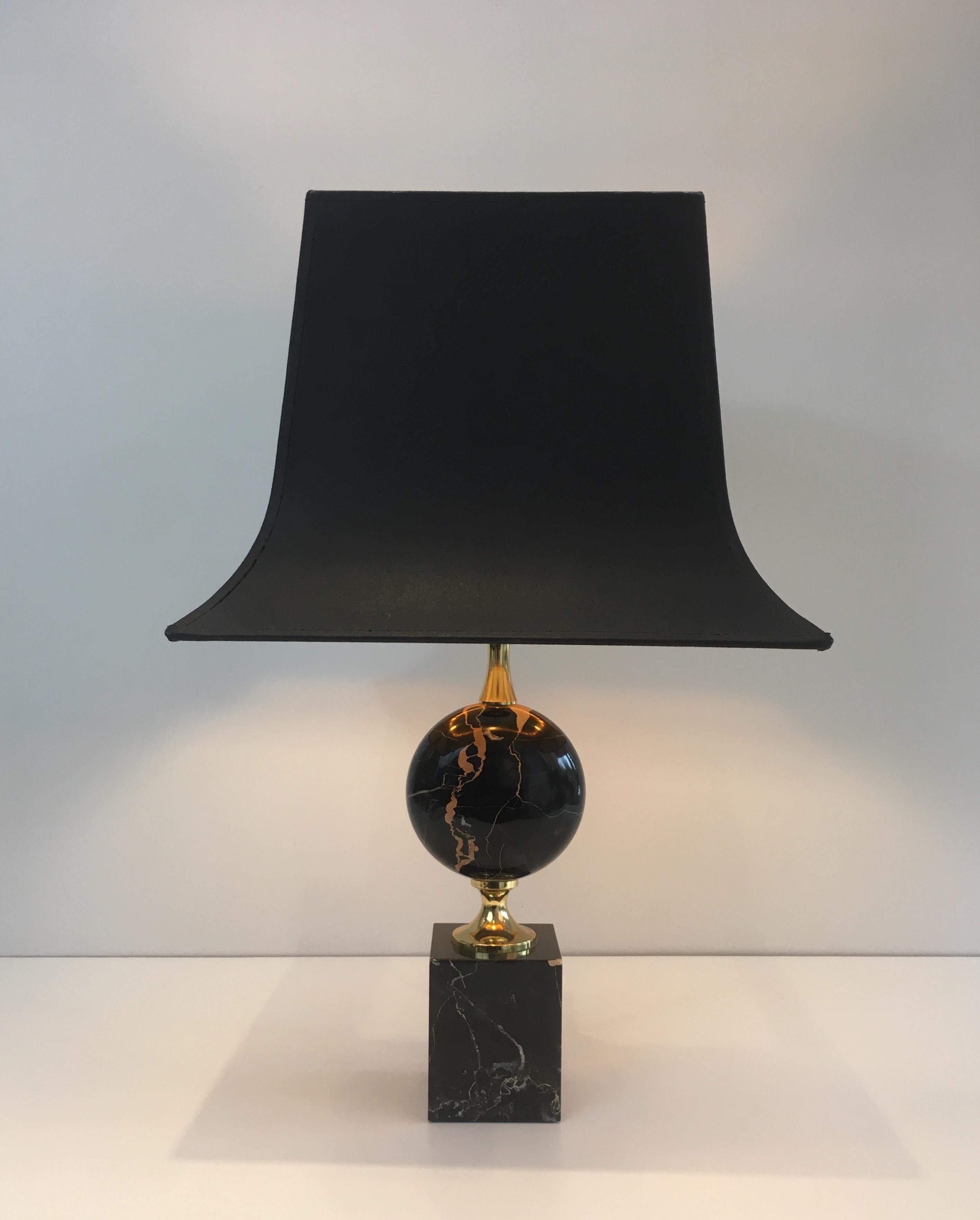 This beautiful table lamp is made of a very nice marble and gilt metal. This is a work by famous French designer Philippe Barbier, circa 1970.
