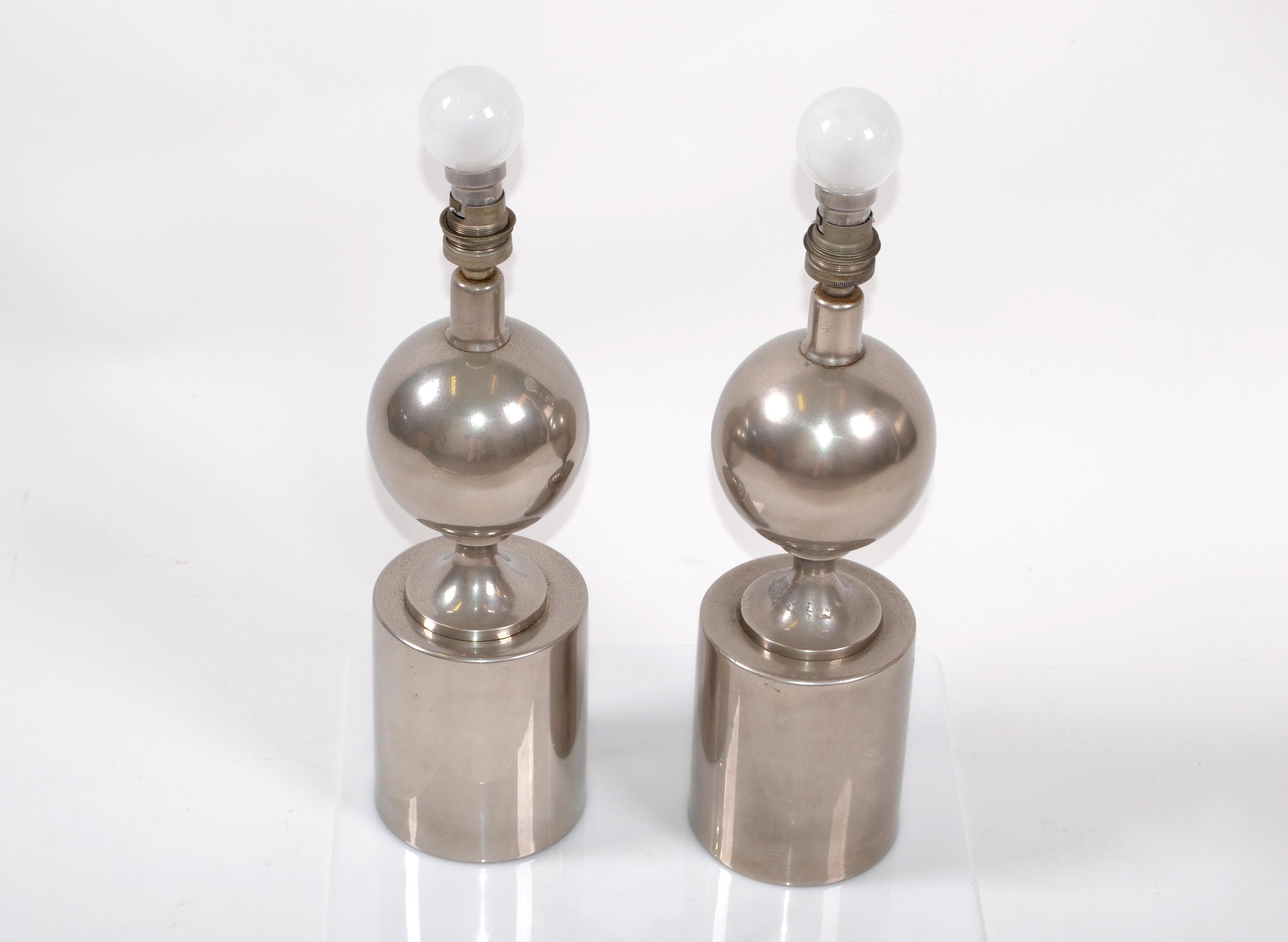 A pair of chrome over steel table lamps designed by Philippe Barbier and made by Maison Barbier in France.
Working condition and each takes one bulb with 40 watts max.
One lamp is marked underneath.