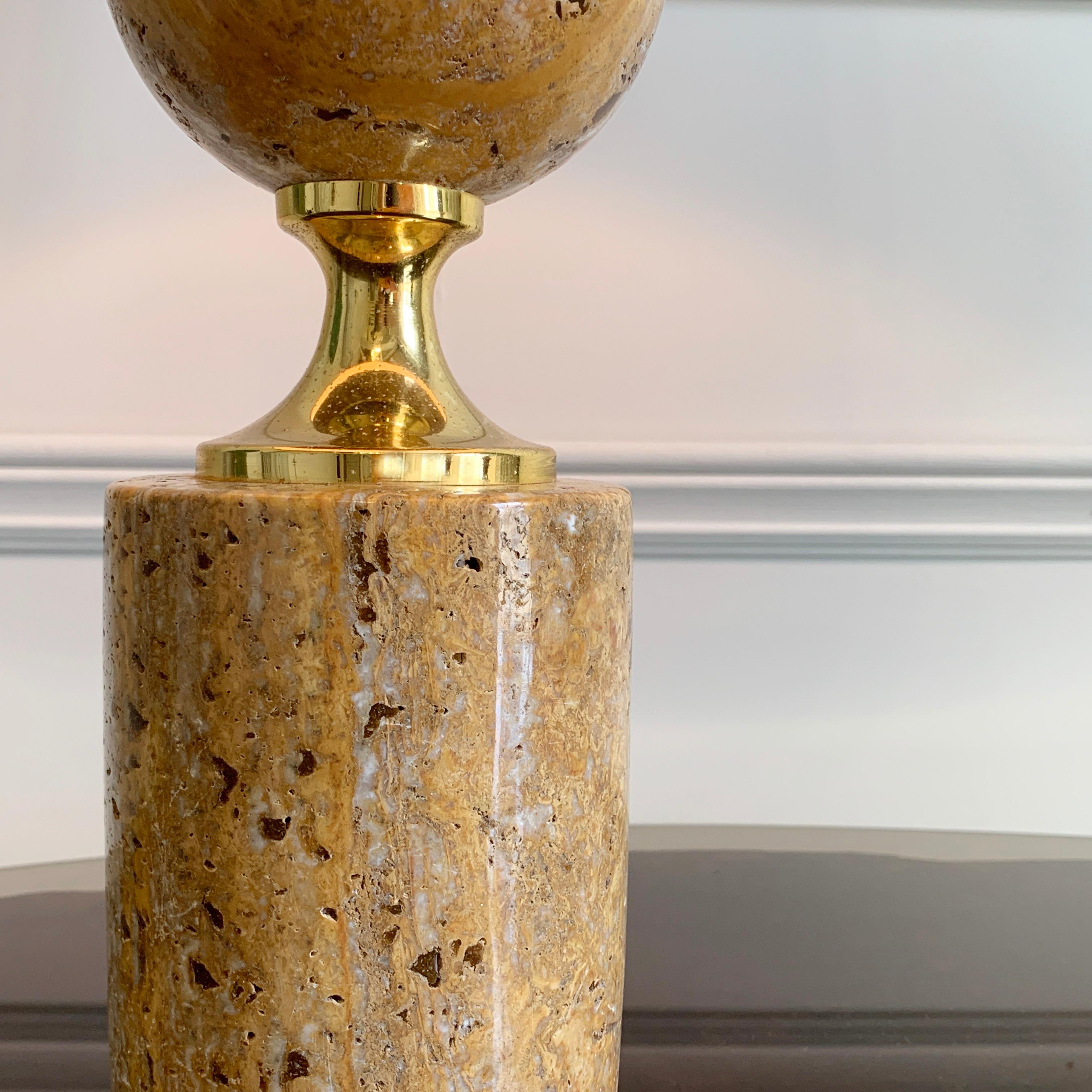 A beautiful and striking, 1970's French travertine and gilt metal table lamp, designed by Philippe Barbier. 

The lamp has been fitted with a new neutral lamp shade, and is in excellent vintage condition.

Measurements with shade: 53.5cm height