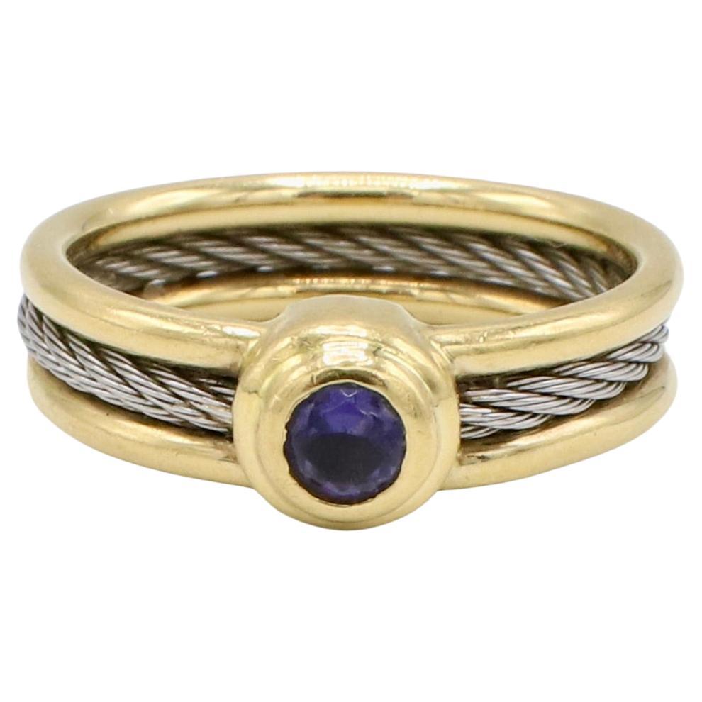 Philippe Charriol 18 Karat Yellow Gold & Steel Cable Amethyst Purple Ring 
Metal: 18k yellow gold & stainless steel 
Weight: 3.87 grams
Size: 5 (US)
Width: 5mm
Amethyst: 3.5mm, approx. .15 carat
