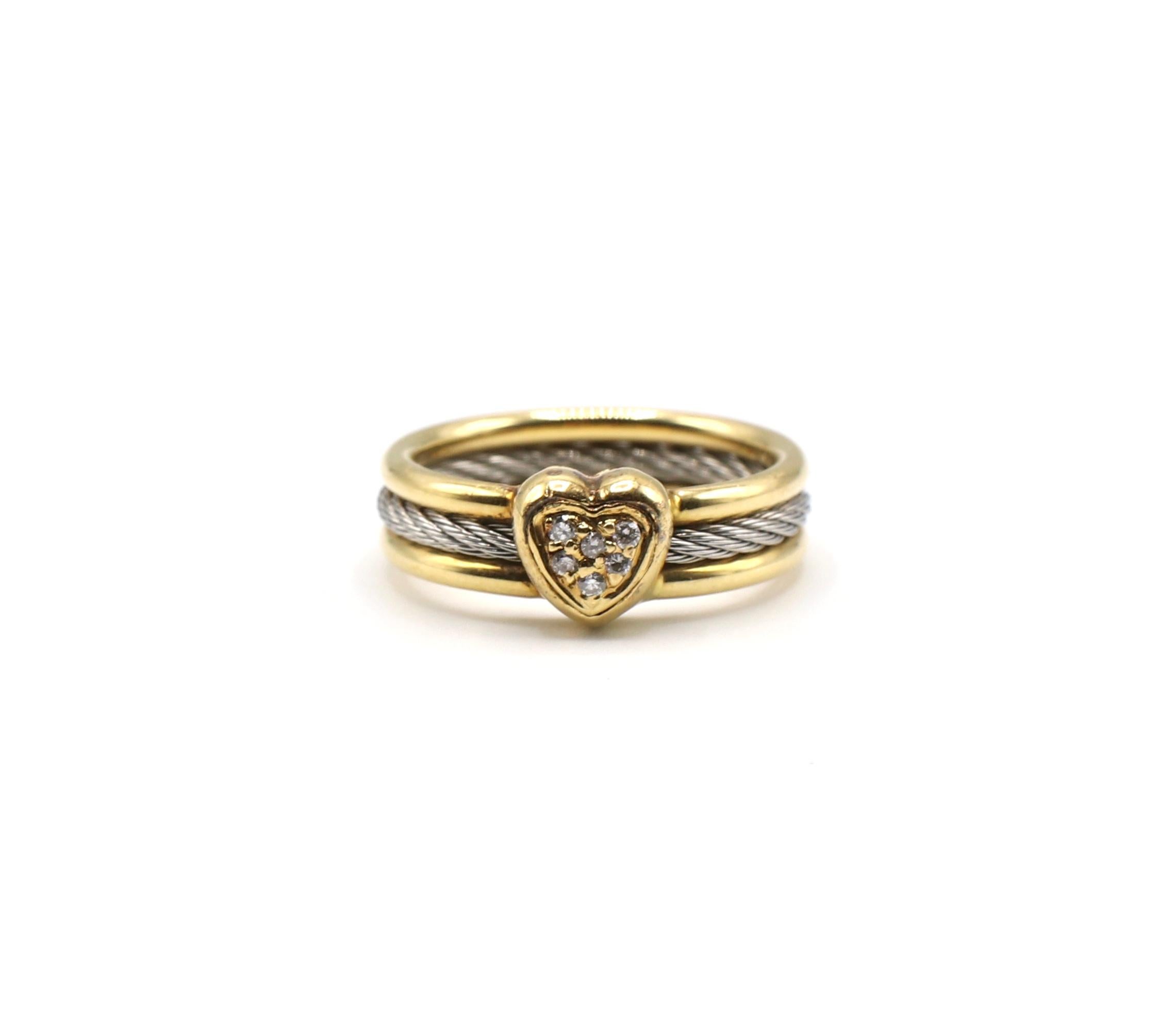 Charriol 18K & Stainless Steel Heart Cluster Diamond Cable Ring Size 5

Metal: 18k Yellow Gold / Stainless Steel
Weight: 3.90 grams
Diamonds: 6 round diamonds measuring approx. .06 CTW G VS
Finger Size: 5
Measurements: Ring Width is 5mm
Stamped: