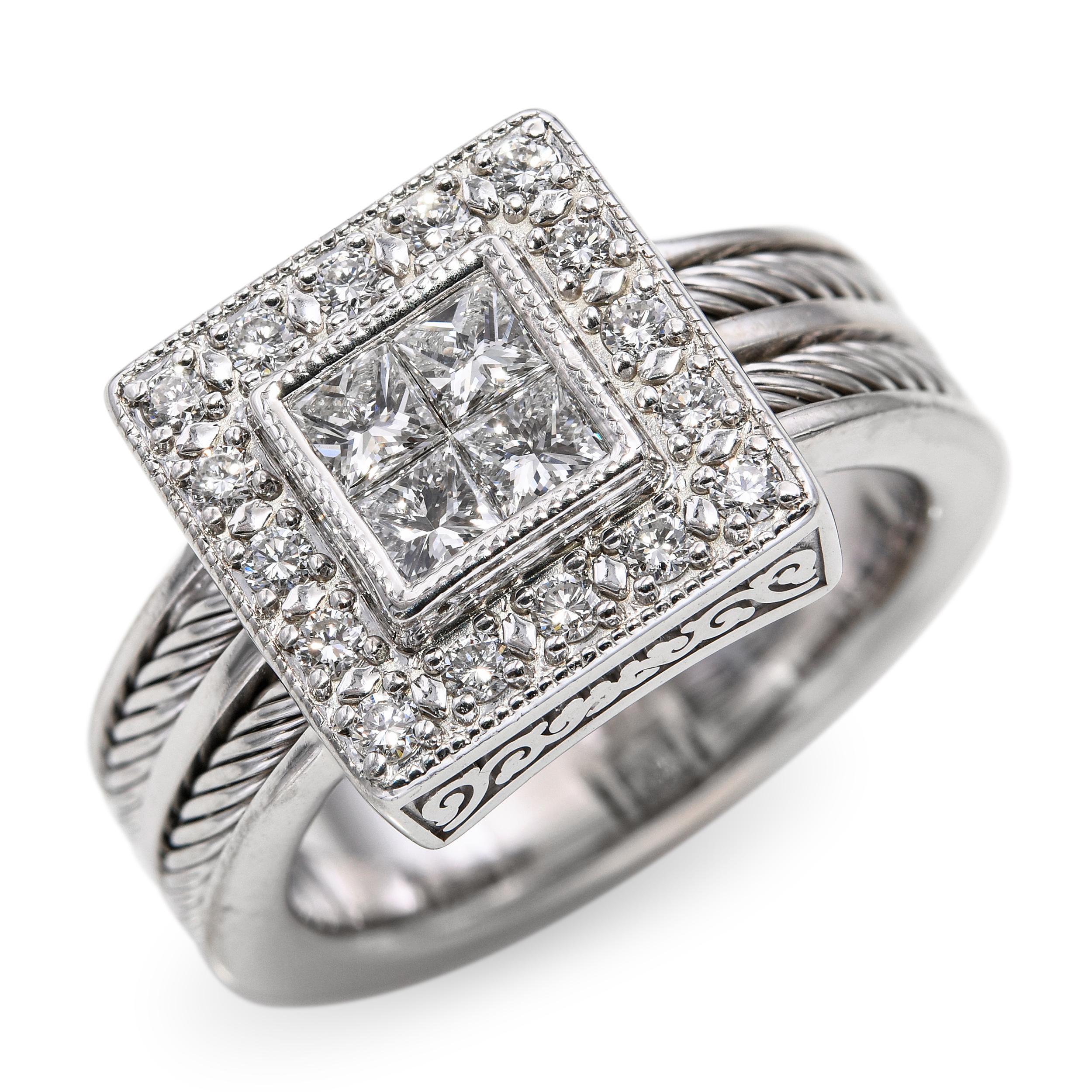 Bague raffinée de Philippe Charriol en or blanc 18 carats, mettant en valeur environ 0,65 carats de diamants ronds de taille brillant de couleur H et de pureté Si1. Le design reflète l'élégance moderne propre à Charriol, avec des lignes épurées et