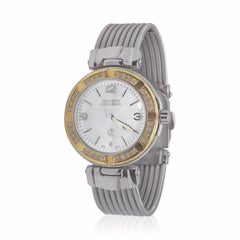 Philippe Charriol Montre en or jaune et blanc 18 carats et diamants