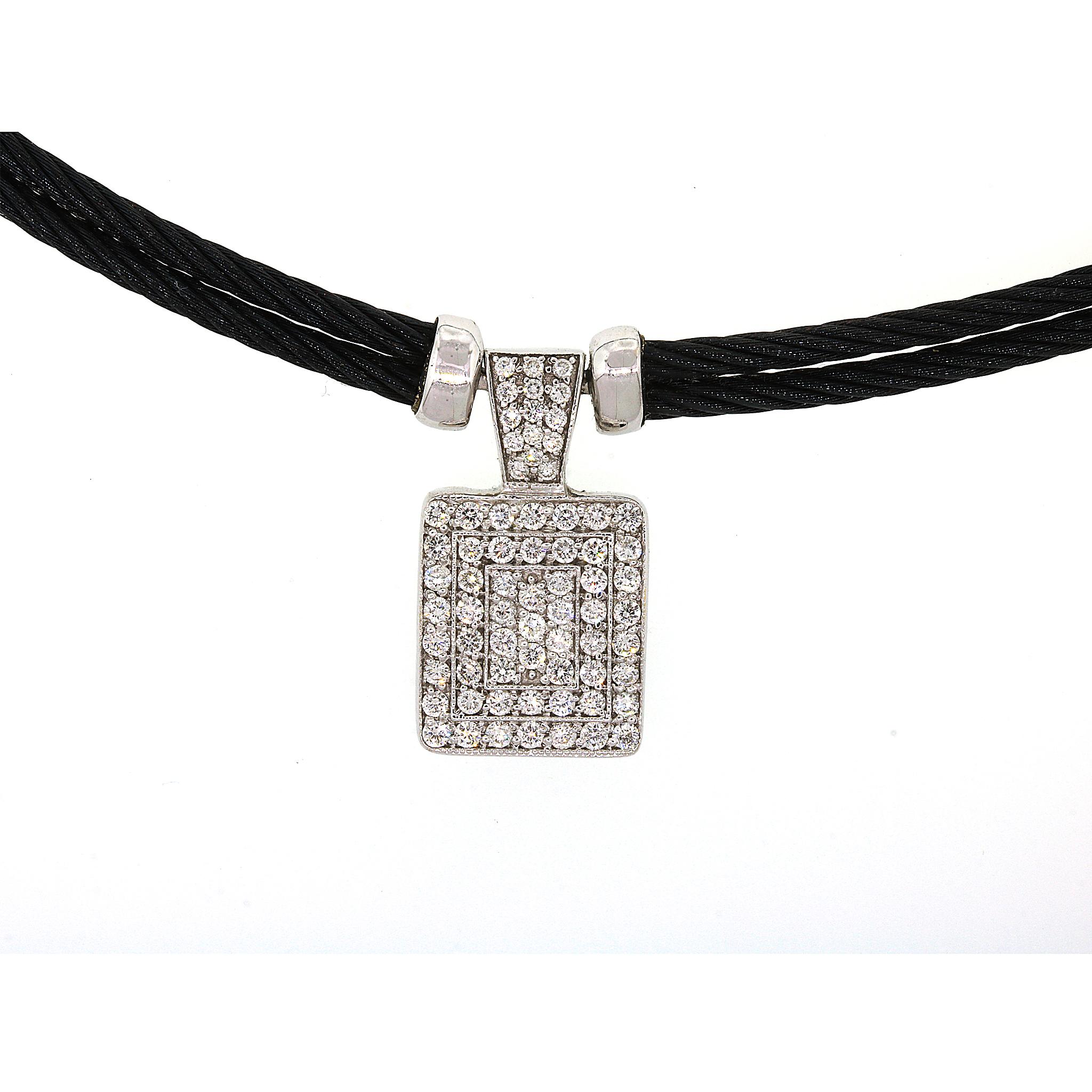 18 kt White Gold
Diamond: 0.65 ct twd
Black Cord Length: 15.5 inches
Pendant measurements: 22mm / 12 mm.
Color / Clarity: E / VVS 

Special Note: Matching Celtic Noir Necklace and Earrings are available individually and as a set. 