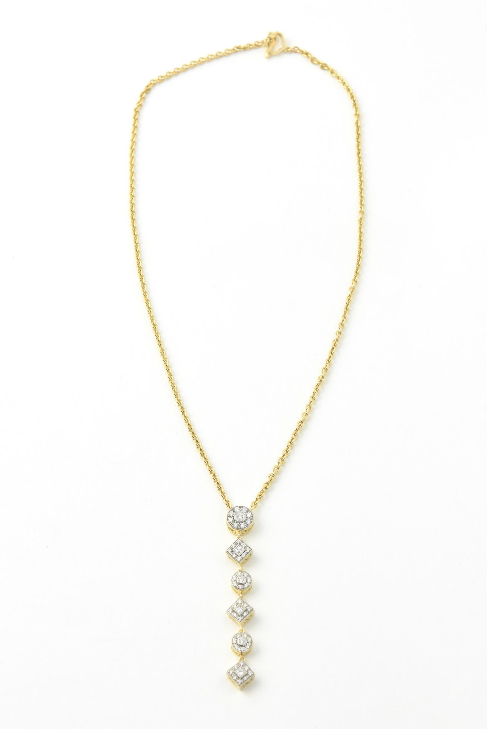 This stunning six section circle and square pave diamond drop 18k yellow gold necklace was designed by Philippe Charriol.  The drop is 2 1/8
