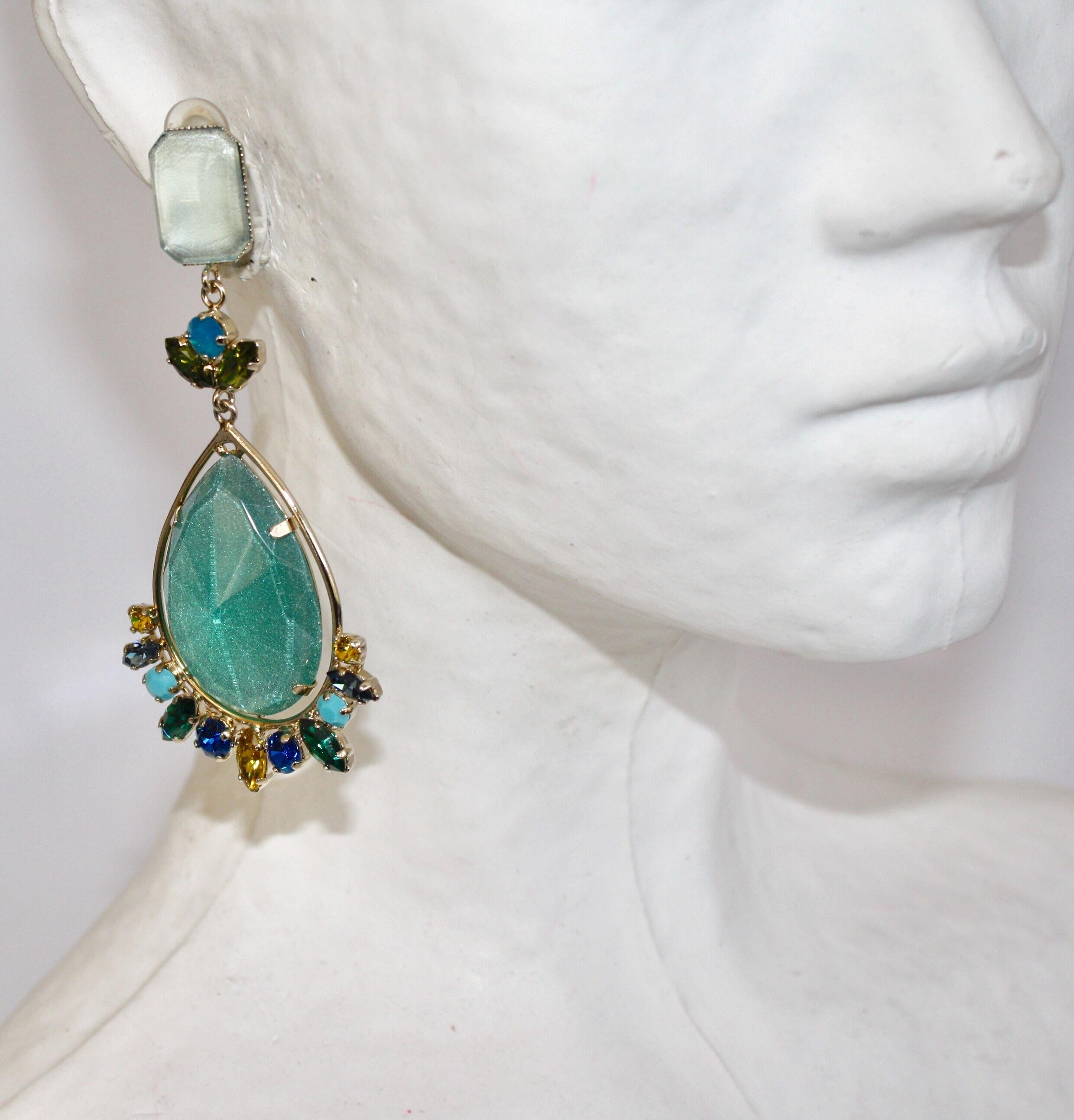 Handmade glass cabochon and Swarovski crystal clip earrings from Philippe Ferrandis. 