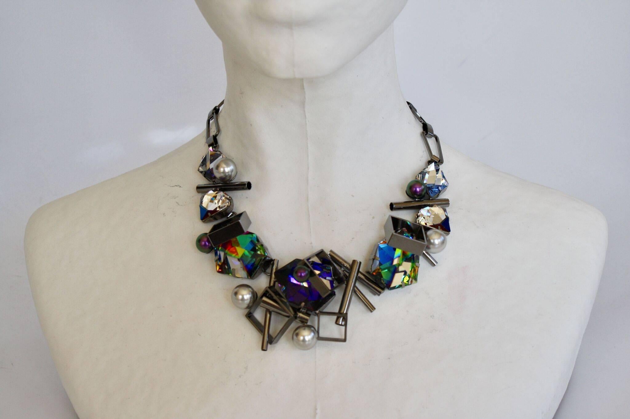 Edgy mixed material black metal modern necklace from Philippe Ferrandis. 