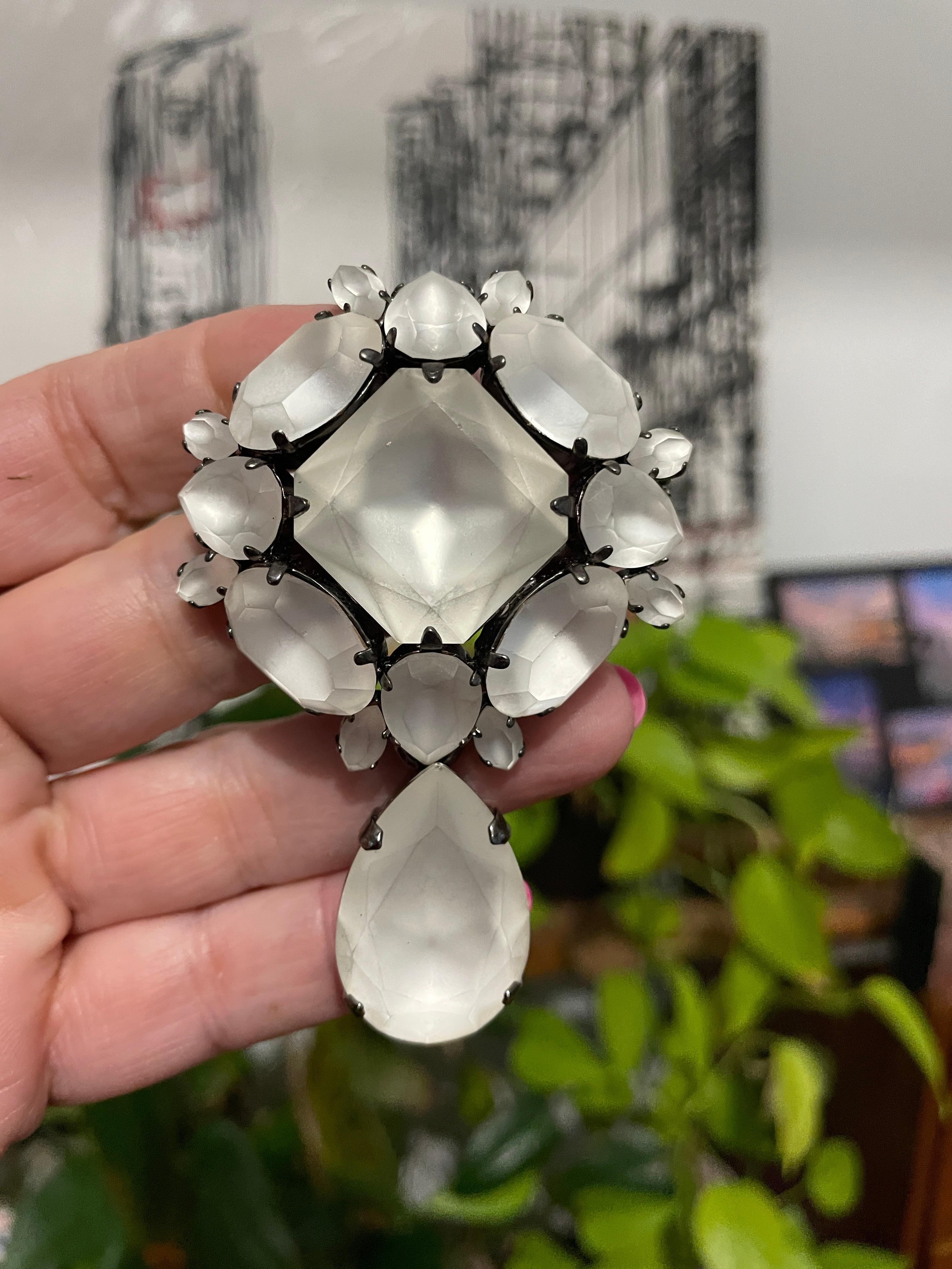 Made in France at his studio is this stunning Ferrandis Dangle Brooch. *Matte Crystals *Prong set faceted pears, ovals, and square stones *swarovski Crystals. Matching pieces available on our storefront. Philippe Ferrandis is an internationally