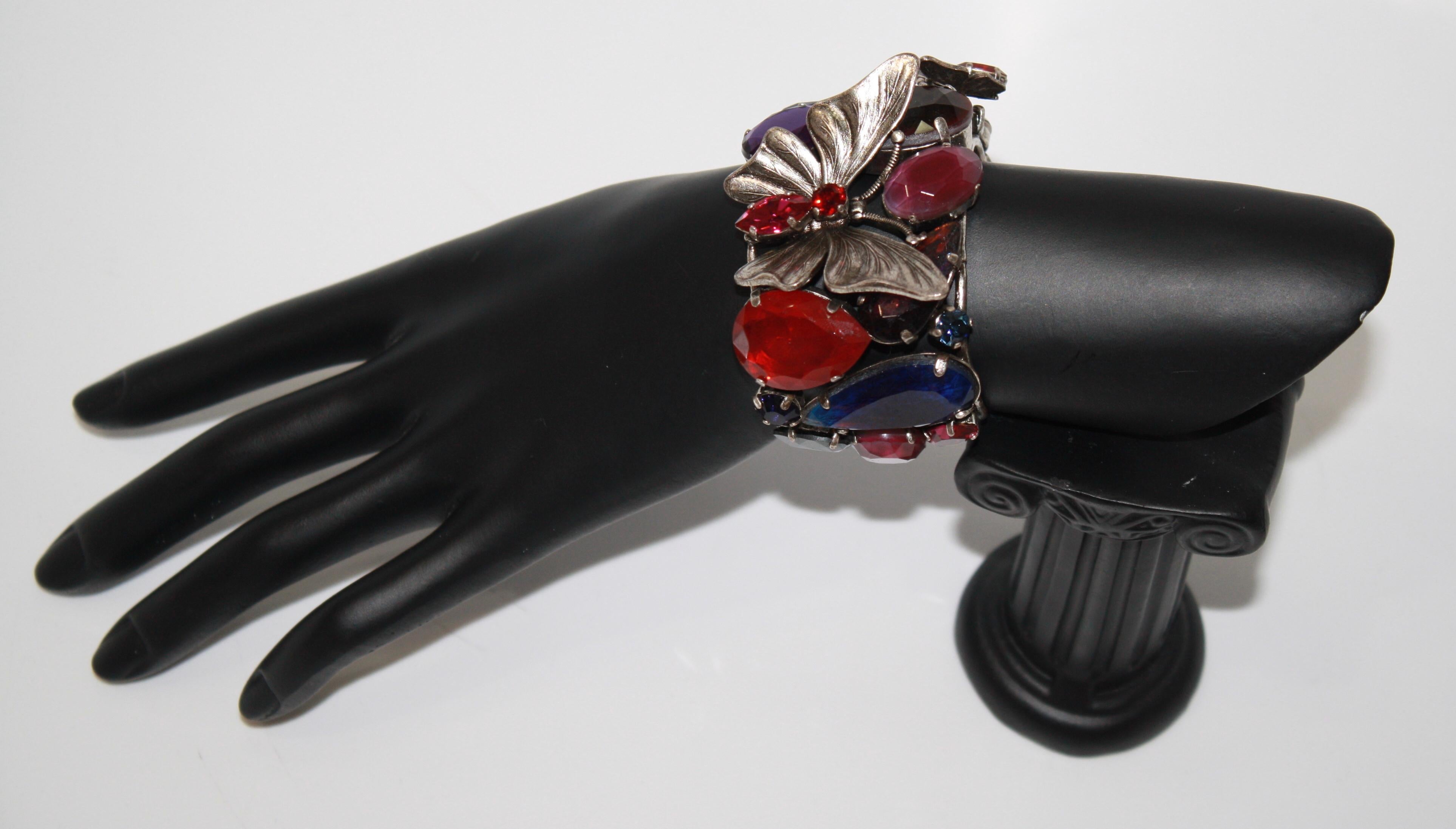 Dark rhodium metal with Swarovski crystal. Metal is soft and cuff can be adjusted to the wrist.