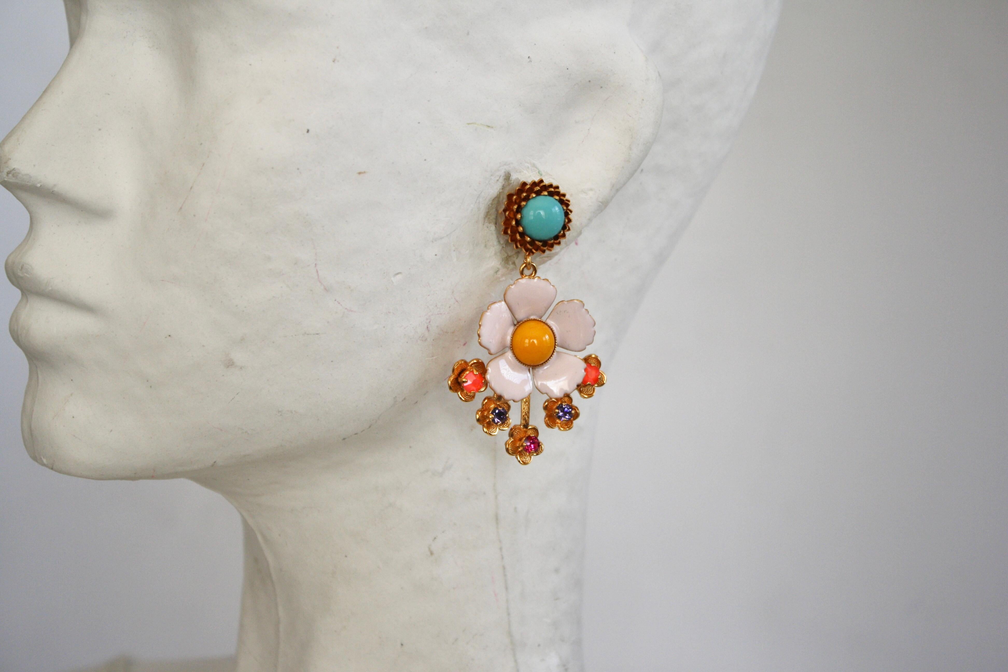 Floral motif pierced earrings made with enamel and glass from Philippe Ferrandis. 