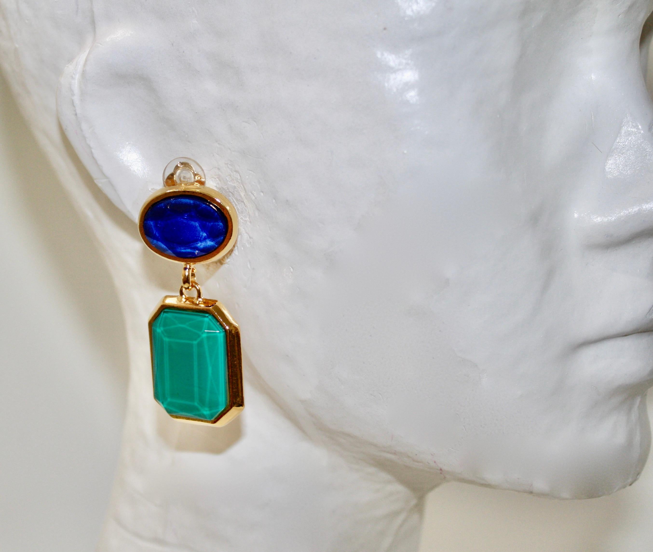 Clip earrings with blue and green resin. 24-carat gilded brass.
Signature on the back
Philippe Ferrandis, French luxury designer. His jewels are hand-made in his workshops in Paris, in the respect of an exceptional know-how.

He has been a parurier