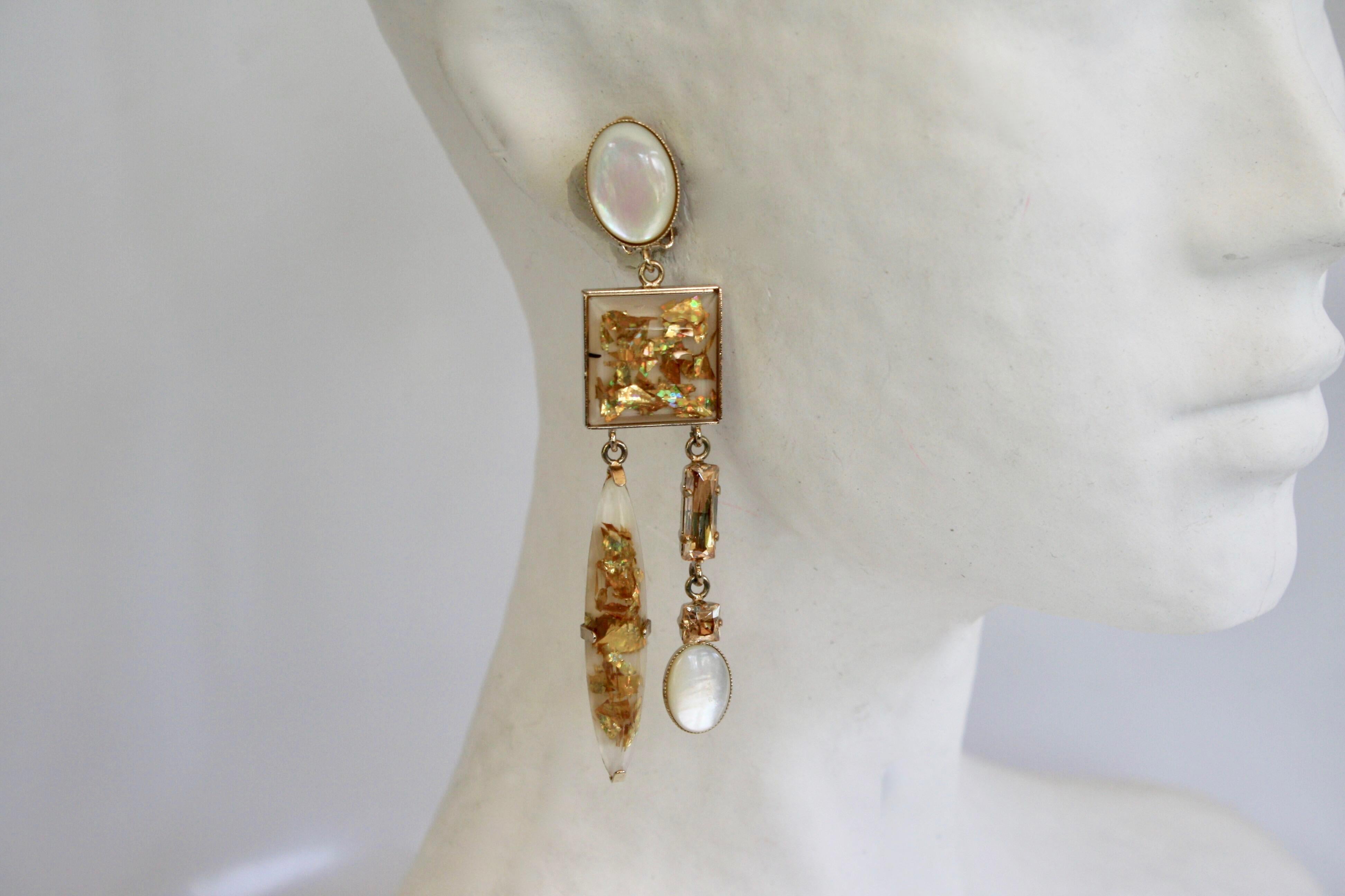 Gold and pearl glass clip earrings from Philippe Ferrandis. 