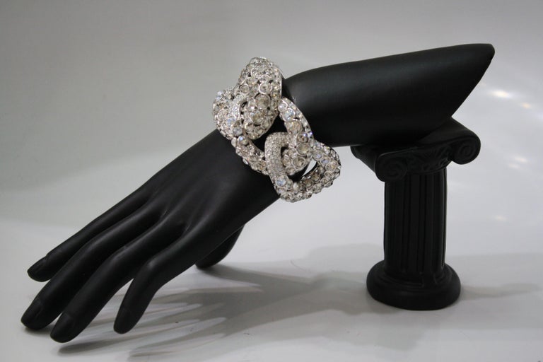 A stunning work of art. Silver plated rhodium encrusted in Swarovski Crystals. Cuff is not adjustable.

Philippe Ferrandis, French luxury designer. His jewels are hand-made in his workshops in Paris, in the respect of an exceptional know-how.  He