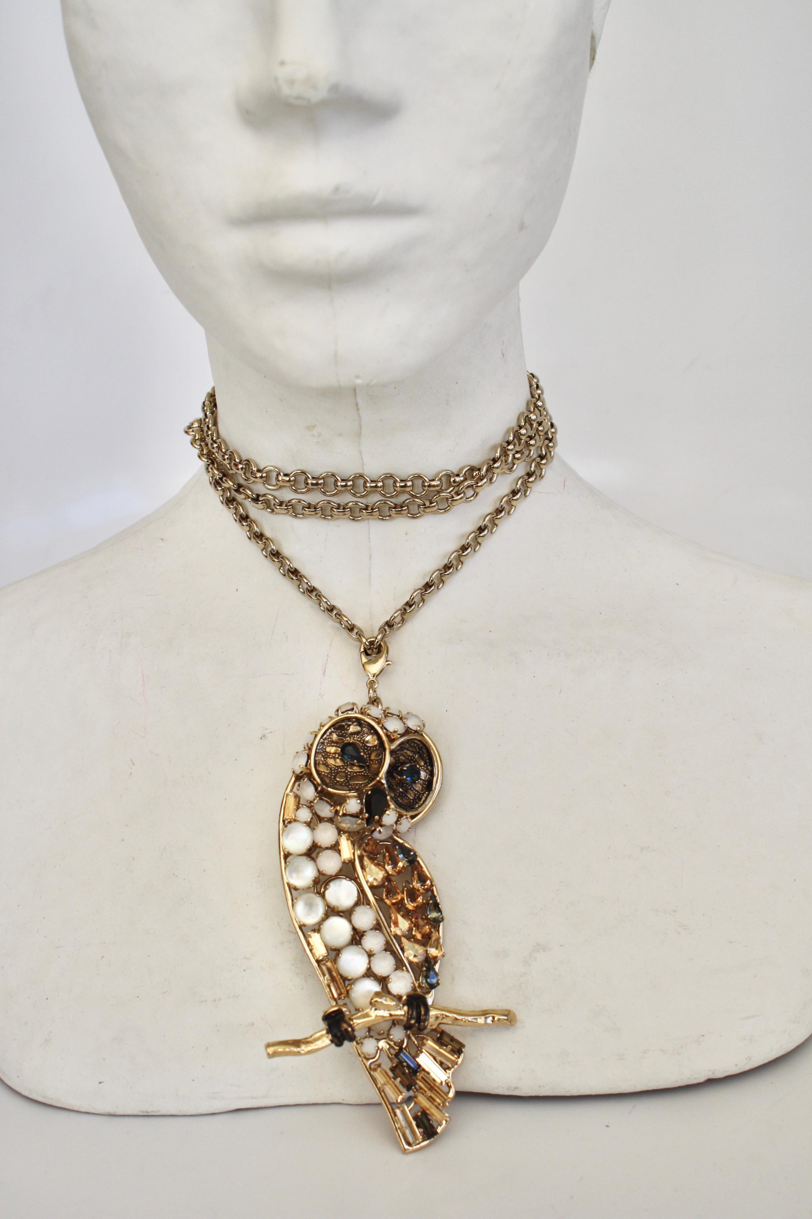 Owl pendant necklace in Swarovski Crystal from Philippe Ferrandis. Owl measures 4.5” long and 1.5” wide.