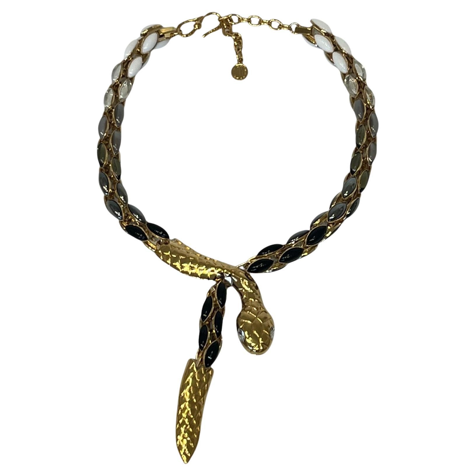 This snake skin is made of handmade glass cabochons and crystals set on 24 carat gilded brass
2” adjustable chain

THE BRAND

Since 1986, PHILIPPE FERRANDIS creates jewellery sets and accessories always different and spectacular.
QUALITY OF