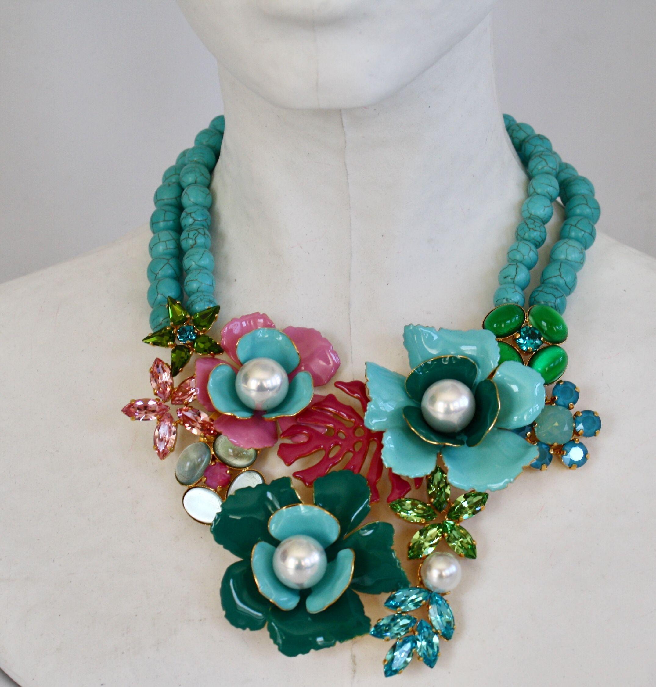 Turquoise bead necklace with enamel and Swarovski Crystal flowers from Philippe Ferrandis. 