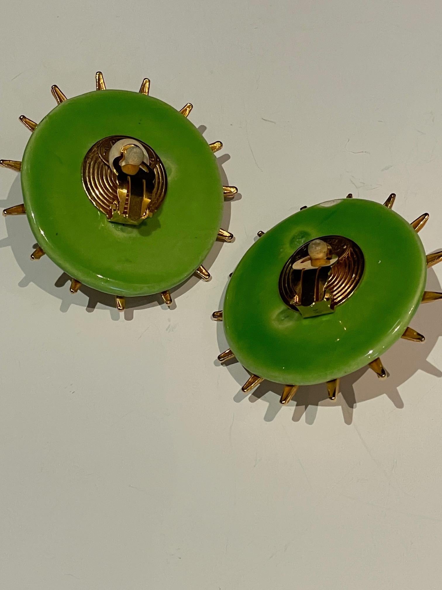 A stunning, very rare vintage collector piece from Philippe Ferrandis Paris. This large sun clip-on earrings are handcrafted with ceramic, multicoloured, lime green, gold and yellow. A Must-have, a very rare collector piece from a private