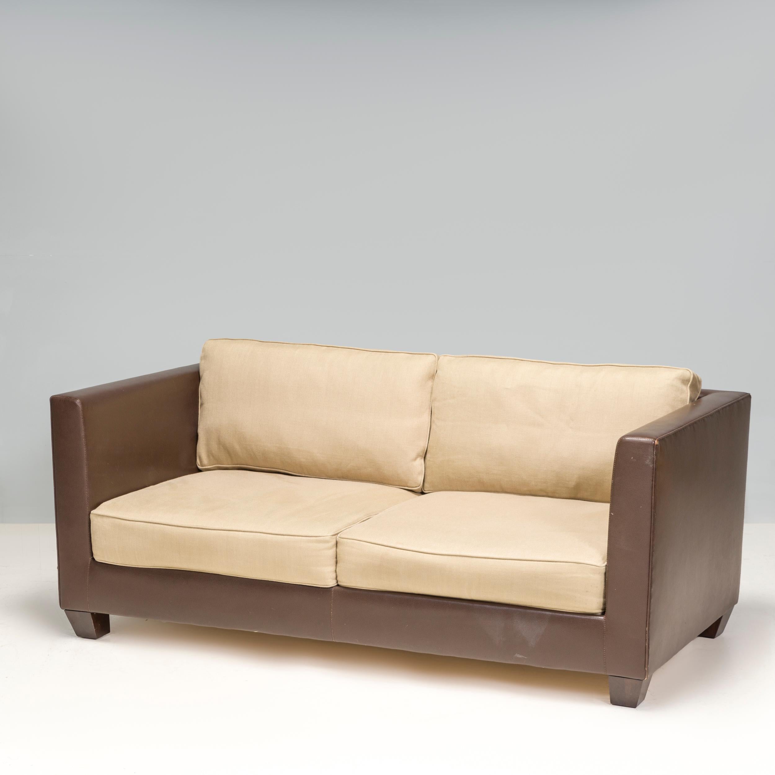 This Philippe Hurel design is a contemporary form fit with a versatile look that suits an array of interiors. Philippe Hurel has over 100 years of creation, craftsmanship and inspiration. This refined leather sofa look features soft cushions and