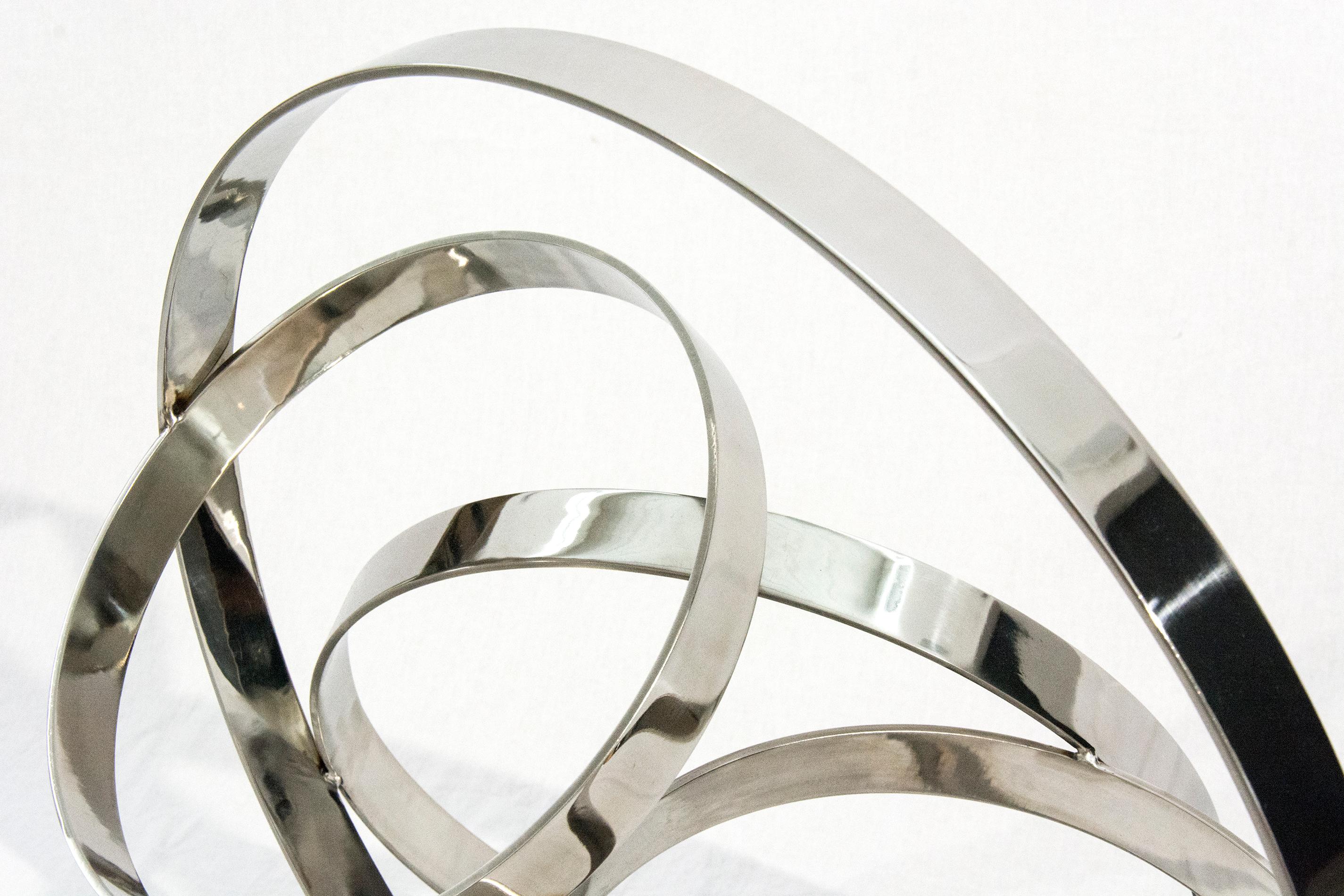 Four Ring Polished Stainless Steel Temps Zero - geometric, modern, sculpture - Gray Abstract Sculpture by Philippe Pallafray