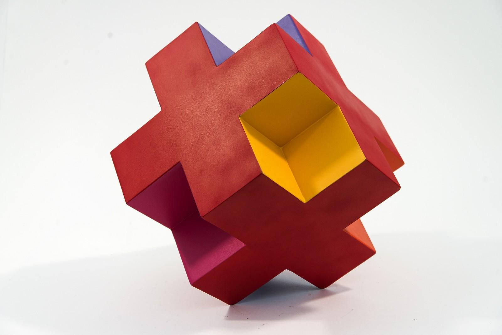 Quebec artist Phillipe Pallafray has used several of the colours of the spectrum—yellow, orange, pink, red and violet to create a playful and modern rubik's cube-like sculpture. Pallafray uses industrial components—steel and stainless steel that he