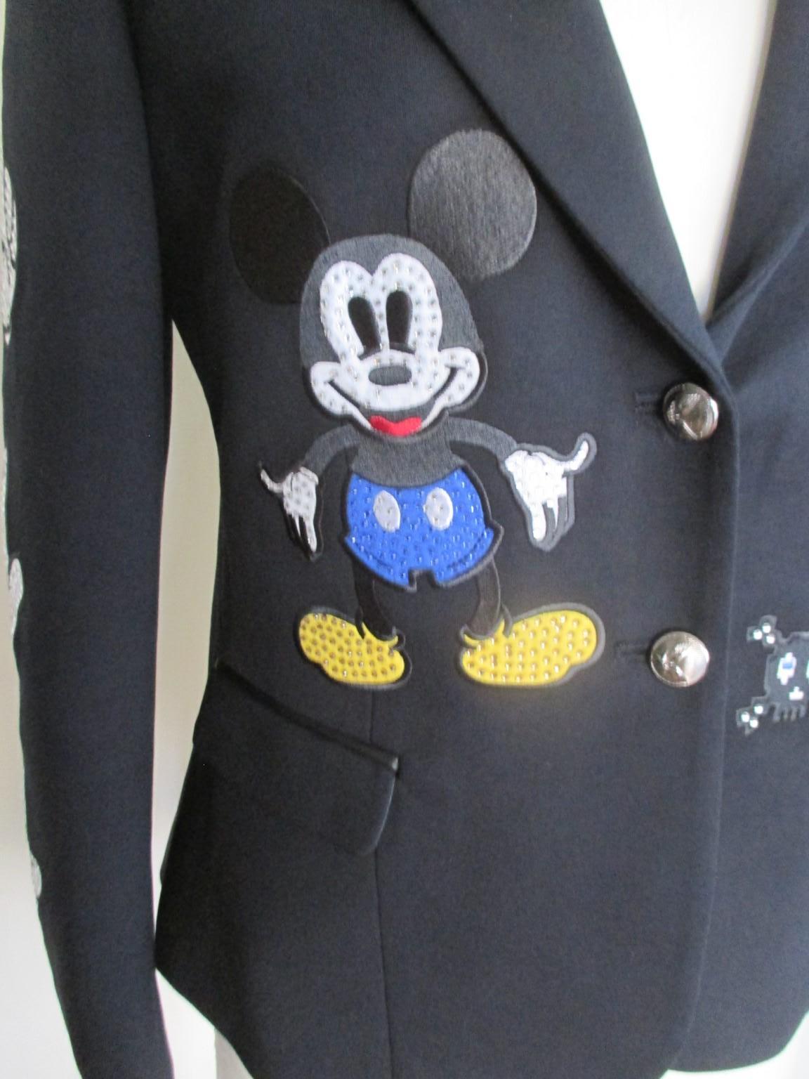 This PP couture collectable jacket is designed with Mickey Mouse and other glitter items.

We offer more Gucci, Hermes and exclusive Fur items, view our frontstore.

Details:,
2 buttons
2 pockets
Fully lined
The size is mentioned Italy 38 / is about