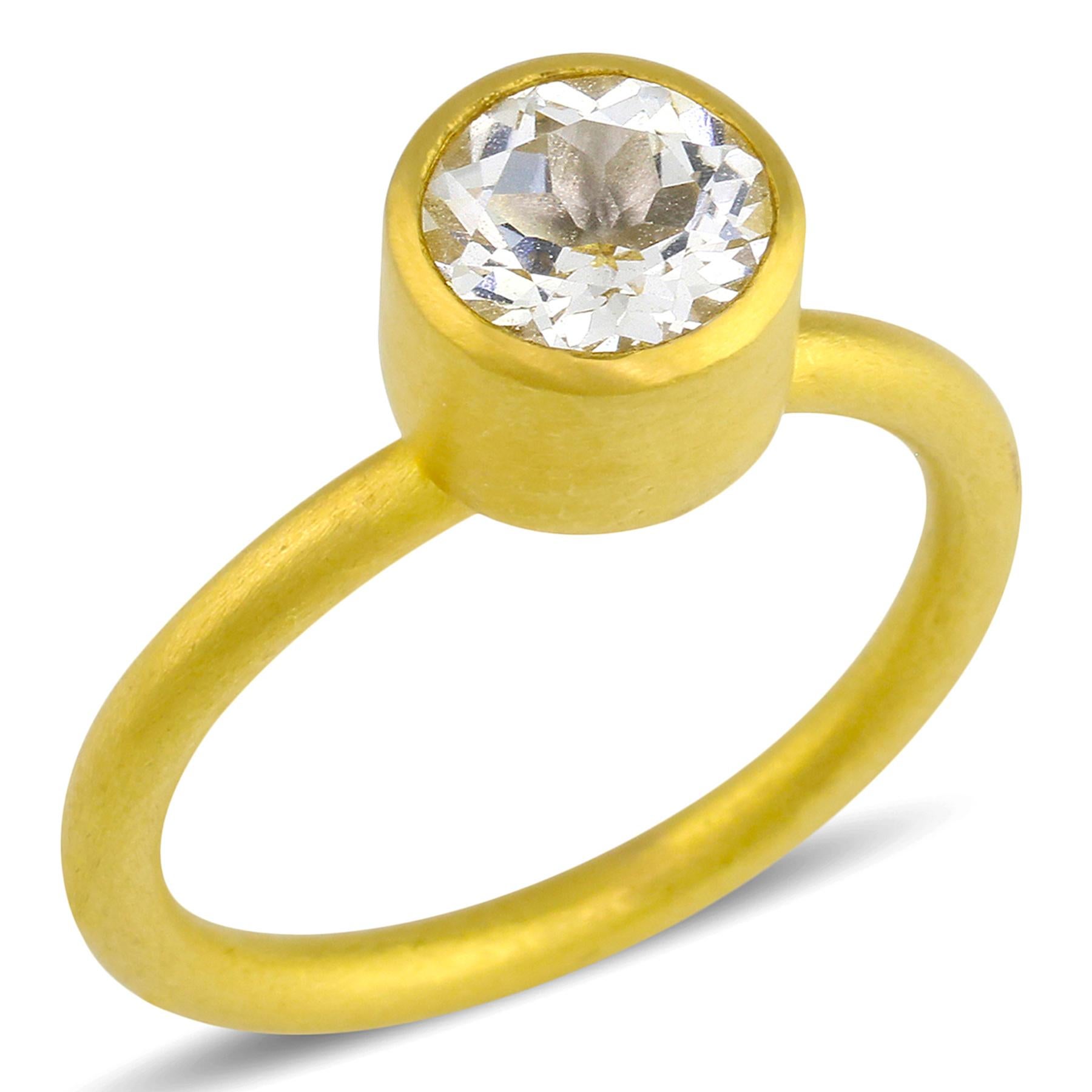 PHILIPPE-SPENCER -  1.6 Ct. Clear Faceted Topaz wrapped in 22K Gold Bezel with Solid Round 20K Gold Ring. Brushed Matte Finish. Size 6 1/8, and is in-stock and ready to ship. Our apologies in advance, this One-Of-A-Kind Solitaire is not resizable.