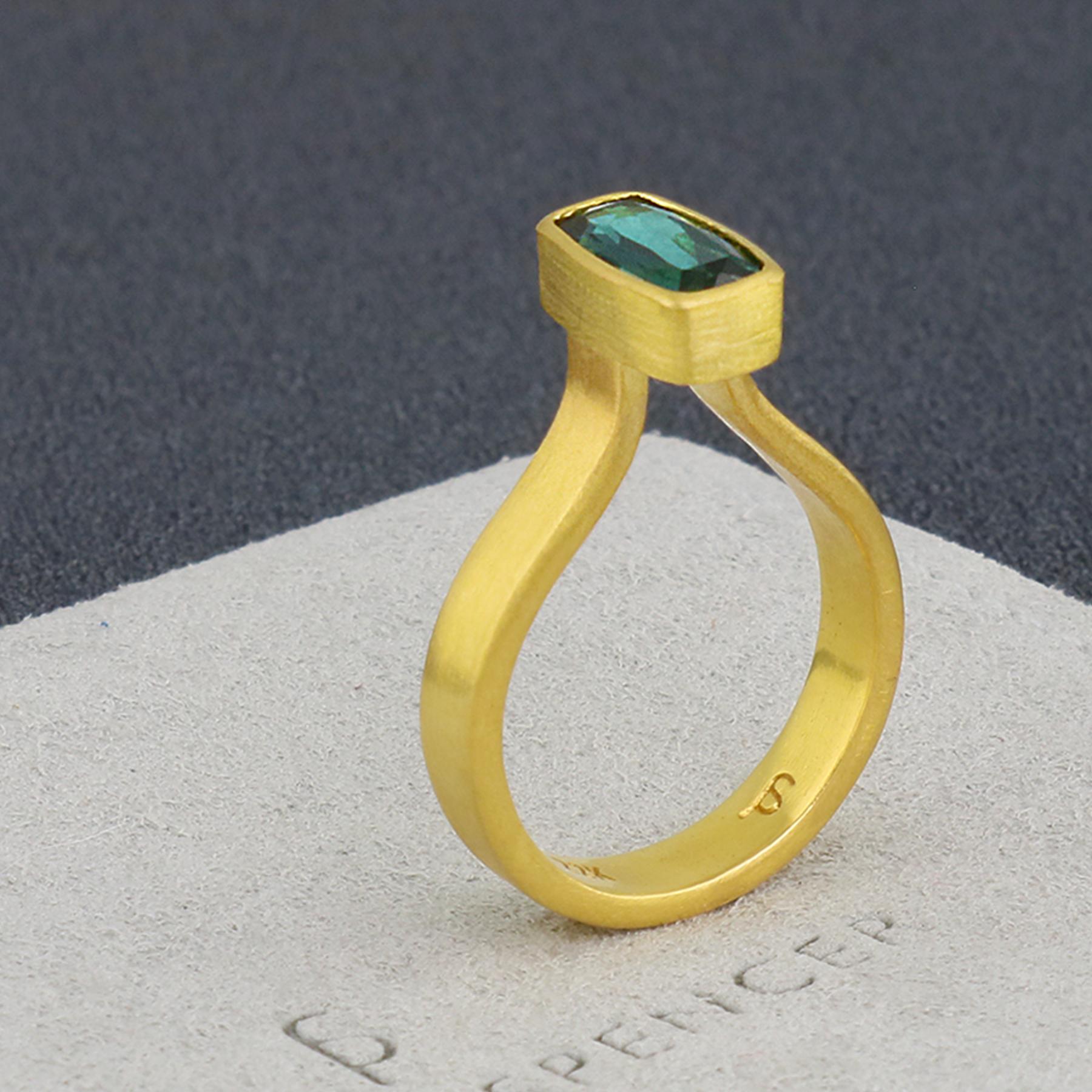 PHILIPPE SPENCER - Solid 22K Gold Completely Hand -Forged One-Of-A-Kind Statement Ring with 1.6 Ct. Teal Tourmaline High-Set in backless 22K Gold Setting. Heavy Matte Brushed Finish. Size 6 1/2 to 6 3/4, and is in-stock and ready to ship. Our