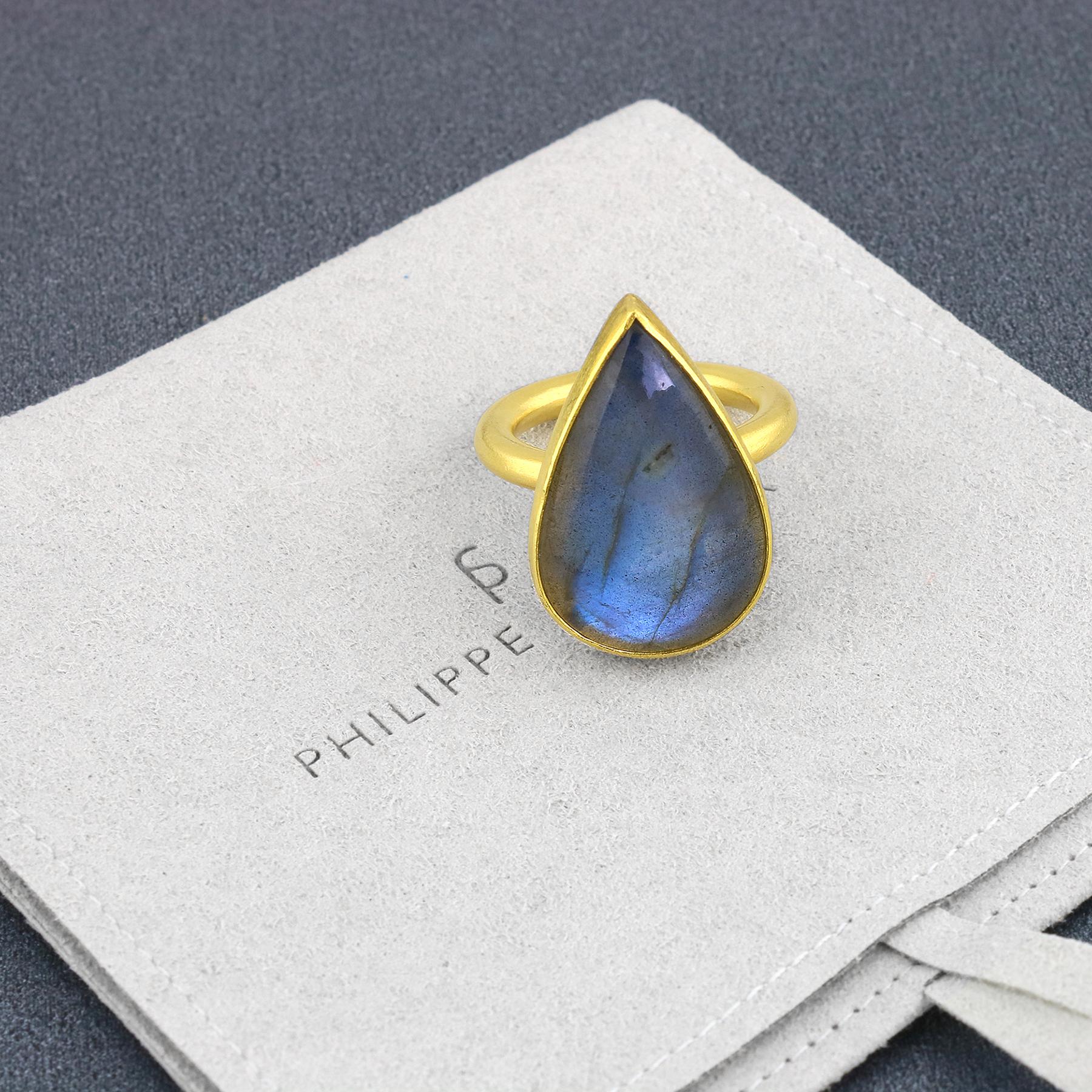 PHILIPPE SPENCER - 20.87 Ct. Labradorite Cabochon wrapped in pure 22K Gold, with Extra Heavy Solid 20K Gold Round Hand & Anvil-Forged Statement Ring.  Heavy Brushed Exterior. Size 8 1/2, and is in-stock and ready to ship. Our apologies in advance,