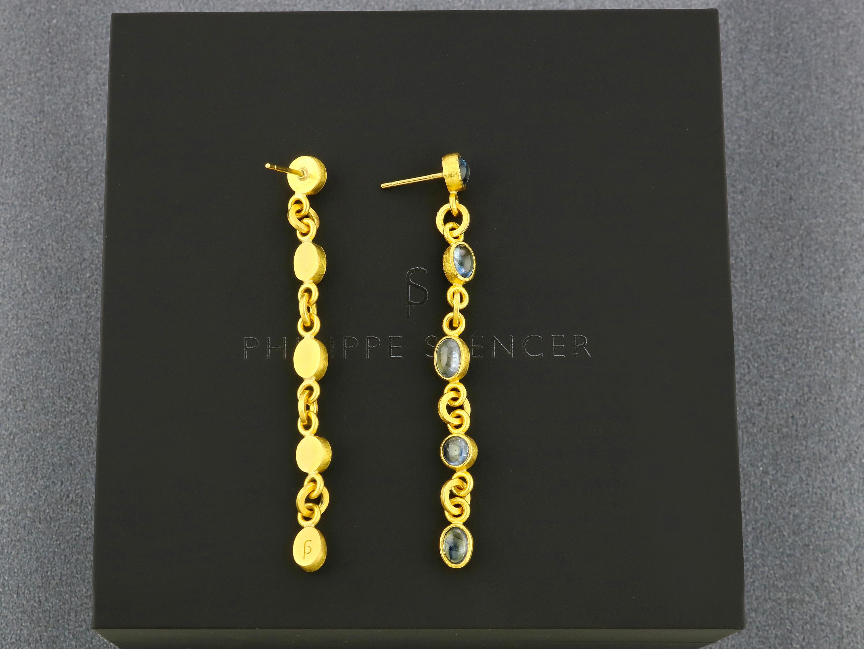 PHILIPPE SPENCER - 7.97 Ct. Total Fancy-Color Cabochon Sapphire Statement Earrings. Each Sapphire is set in Pure 22K Gold with Solid 20K Gold Connection Links. 18K Post Back & Friction Nut for durability. An authentically Hand-Forged & Unique