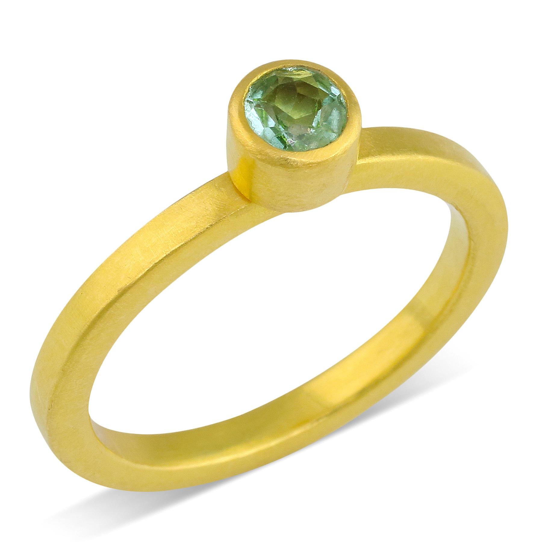 PHILIPPE-SPENCER -   .30 Ct. Faceted Teal Tourmaline wrapped in 22K Gold Bezel Setting, with Anvil-Forged Solid 20K Gold 2.25mm x 2mm Band. Heavy Brushed Exterior, Mirror Polish Interior.  Size 6 3/4, and is in-stock and ready to ship. Our apologies