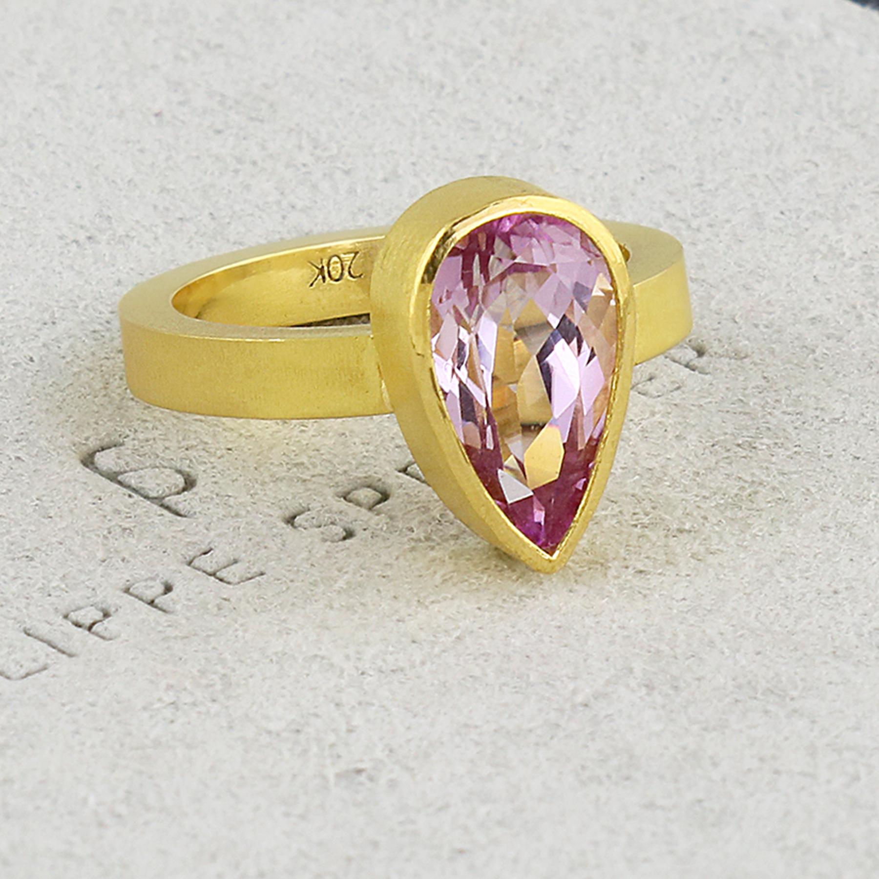 PHILIPPE SPENCER - Rare 3.85 Ct. Fine Brilliant Pink Brazilian Teardrop Morganite wrapped in backless 22K Gold setting with Solid 20K Gold Hand & Anvil-Forged Statement Ring. Heavy Brushed Exterior with Polished Interior Finish. Size 6 1/4, and is
