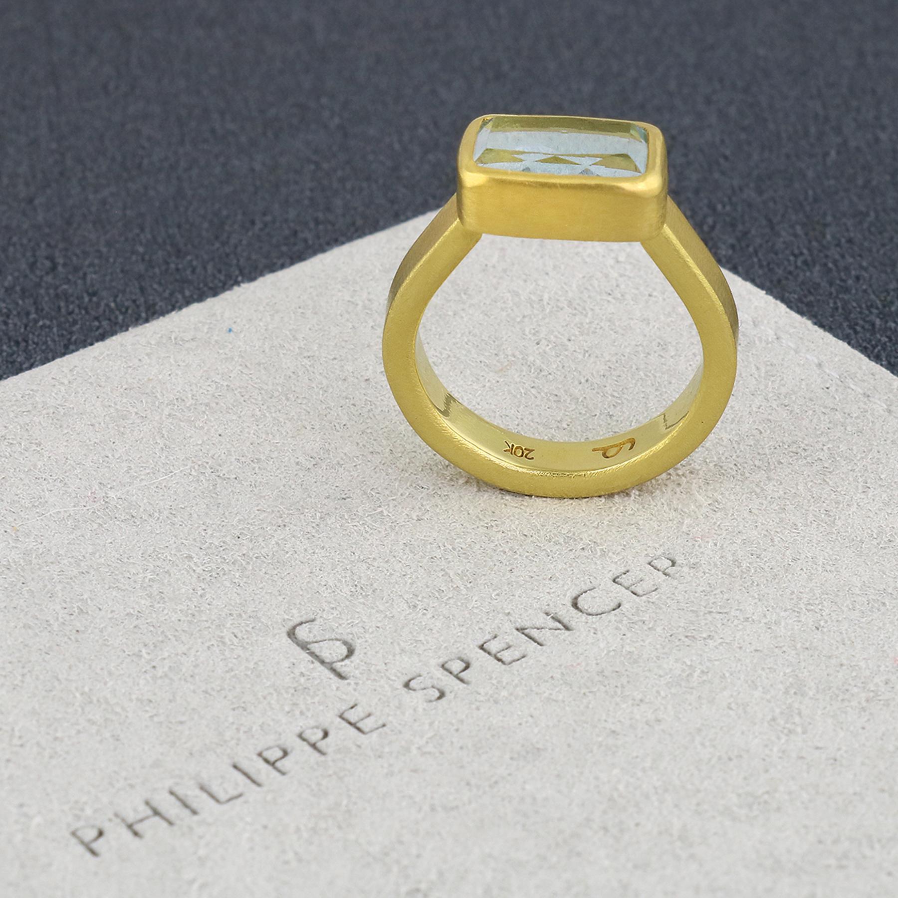 PHILIPPE SPENCER - 4.03 Ct. Extra - Fine Rectangle Cushion Cut Aquamarine  wrapped in backless 22K Gold setting with Solid 20K Gold Heavy Hand & Anvil-Forged Statement Ring.  Heavy Brushed Exterior, Mirror Polished Interior Finish.  Size 6, and is