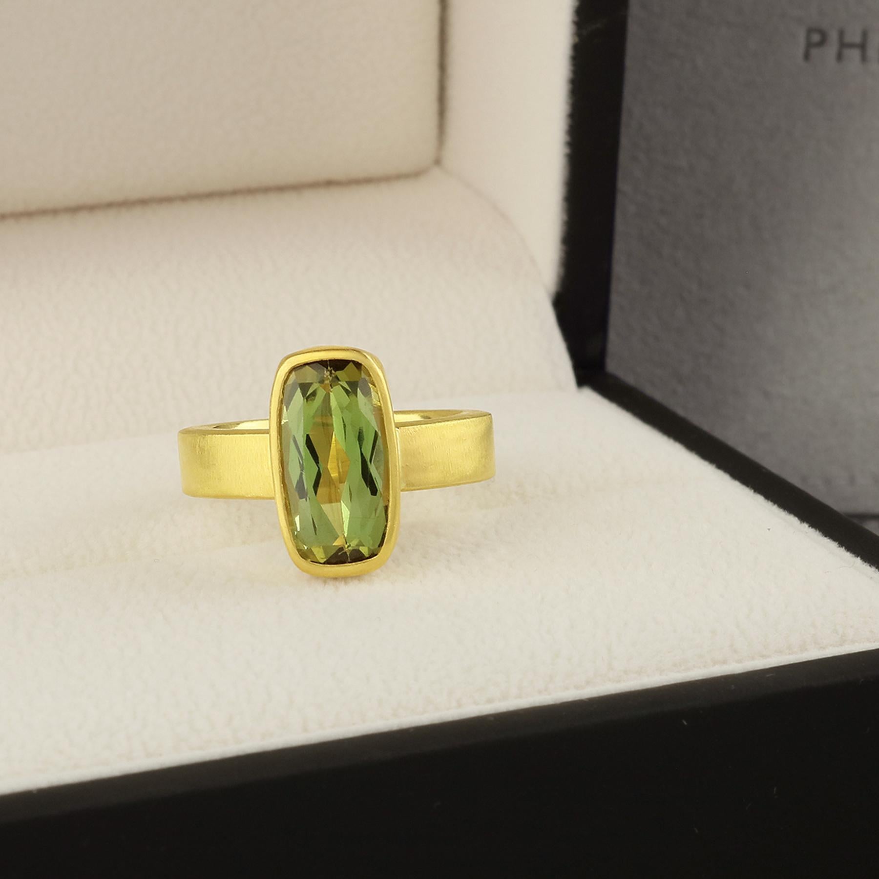 PHILIPPE SPENCER - 5.17 Ct. Faceted Olive Tourmaline wrapped in backless 22K Gold setting with Solid 20K Gold Hand & Anvil-Forged Statement Ring.  Heavy Brushed Exterior, Mirror Polish Interior Finish.   Size 7  1/2, and is in-stock and ready to