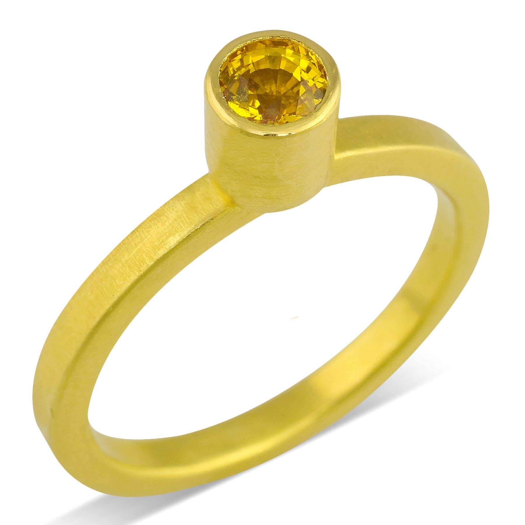 PHILIPPE-SPENCER -   .65 Ct. Round Faceted Yellow Sapphire wrapped in 22K Gold Bezel Setting, with Anvil-Forged Solid 20K Gold 2.25mm x 2mm Band. Heavy Brushed Exterior, Mirror Polish Interior.  Size 8, and is in-stock and ready to ship. Our
