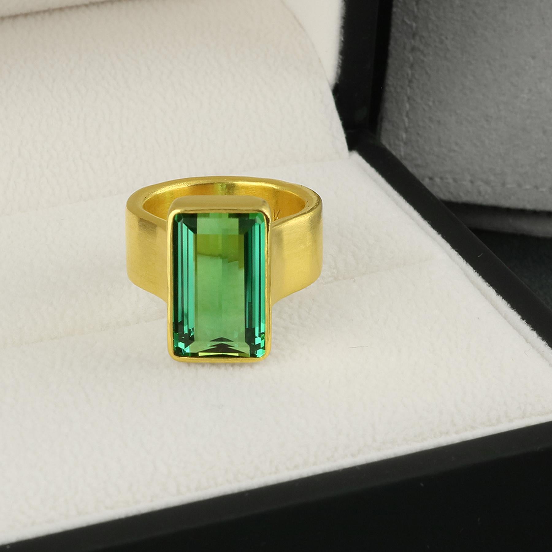PHILIPPE SPENCER - Solid 22K Gold Completely Hand -Forged One-Of-A-Kind Wide-Band Statement Ring with 8.4 Ct. Extra-Fine Emerald Cut Green Tourmaline set in backless 22K Gold Setting. Heavy Matte Brushed Finish. Size 6 1/2 to 6 3/4, and is in-stock