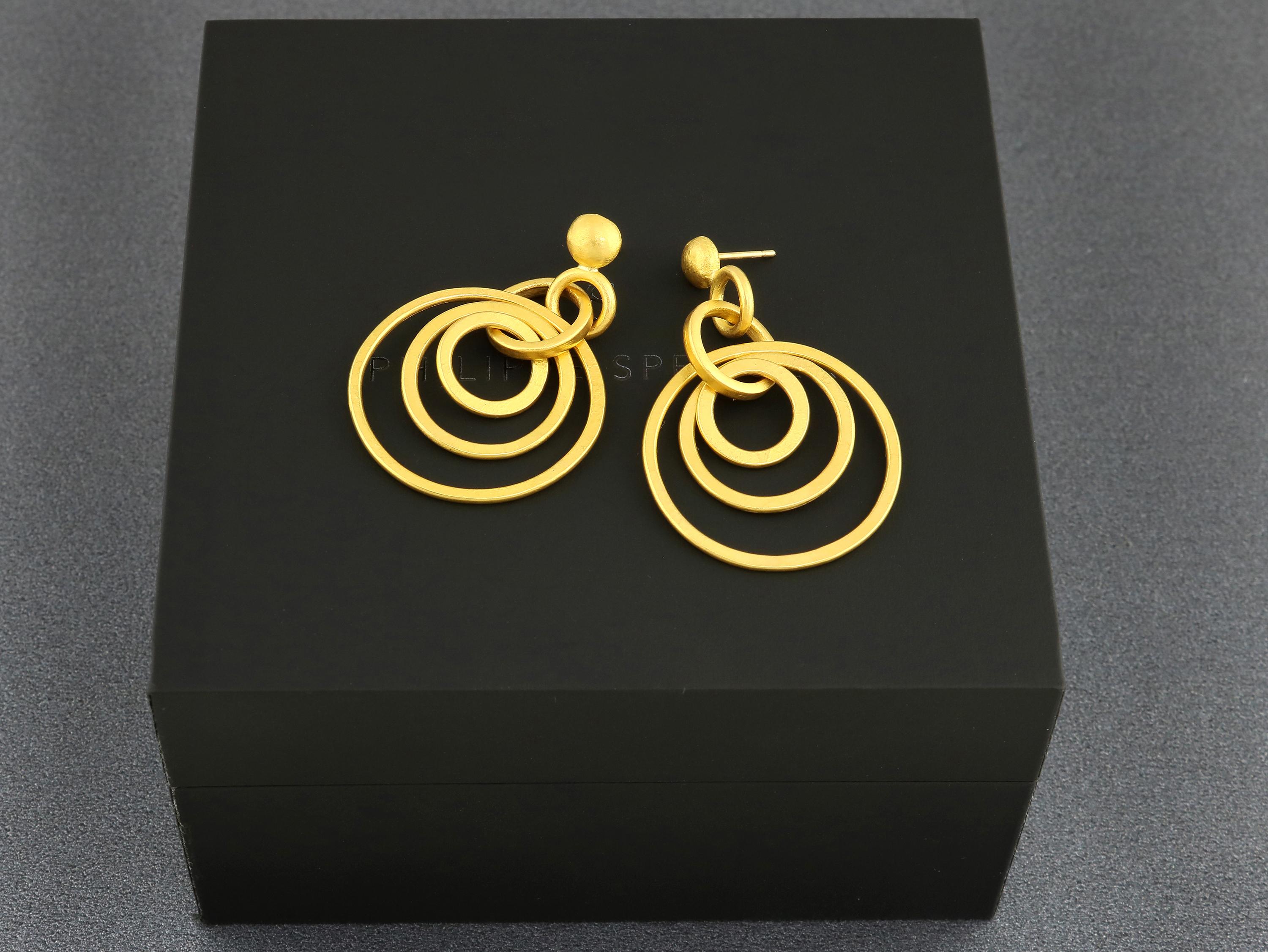 PHILIPPE SPENCER -  Solid 22K Gold Graduating Hoop Dangling Earrings. (18K Gold Post & Friction Back for durability). Each pair is a unique, authentically smithed One-Of-A-Kind work of art. 

These glorious completely Hand-Forged Graduating Hoop