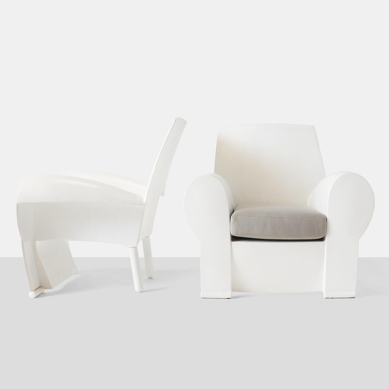 A pair of fiberglass Richard III lounge chairs, by Philippe Starck. Open at the side, and supported by two back legs with a thin fiberglass front side, creating a fun silhouette.
Priced as a pair.
