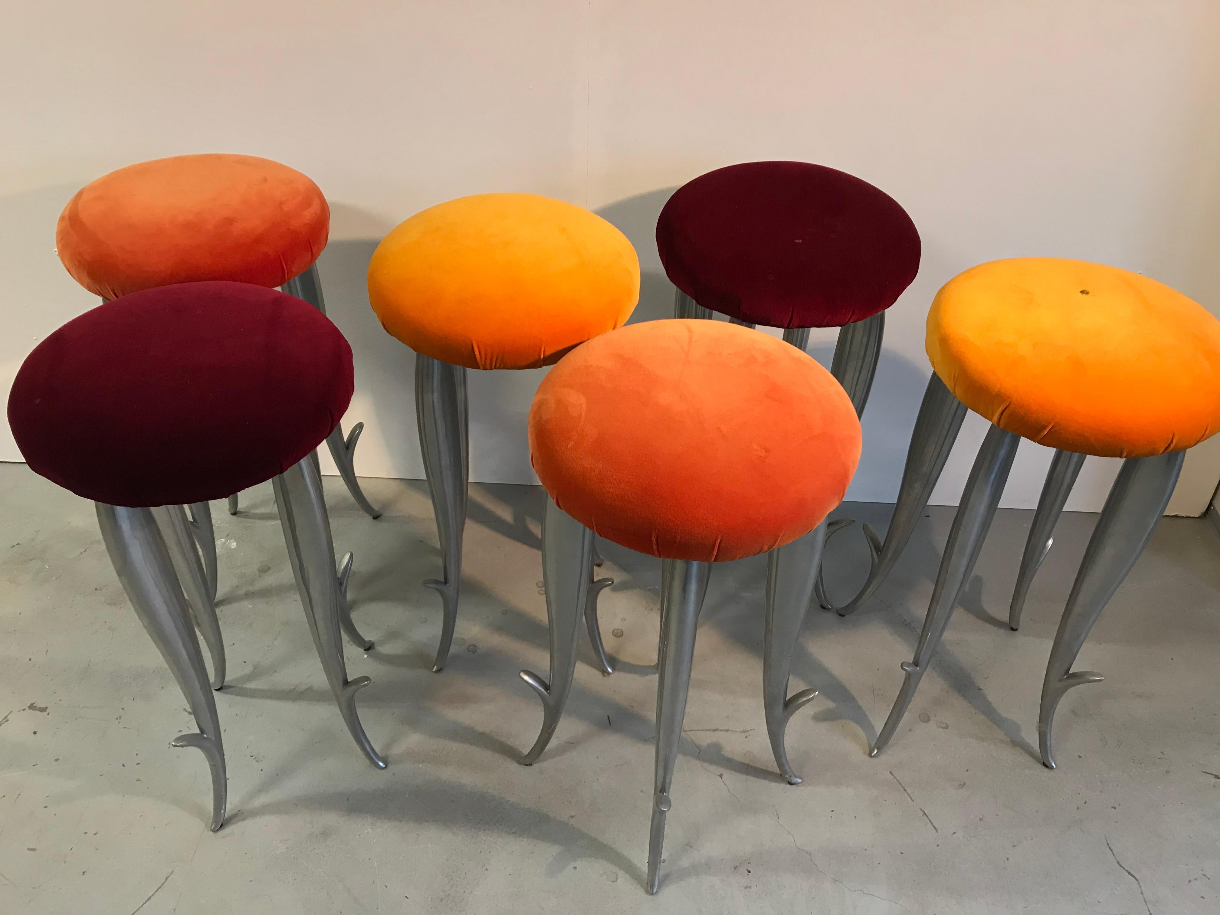 Set of 6 aluminium bar stools designed by the French designer Philippe Starck .They are called Royalton. He is known for his wide range of designs and those stools are a great example. Very sturdy yet elegant, very heavy and refined at the same time.