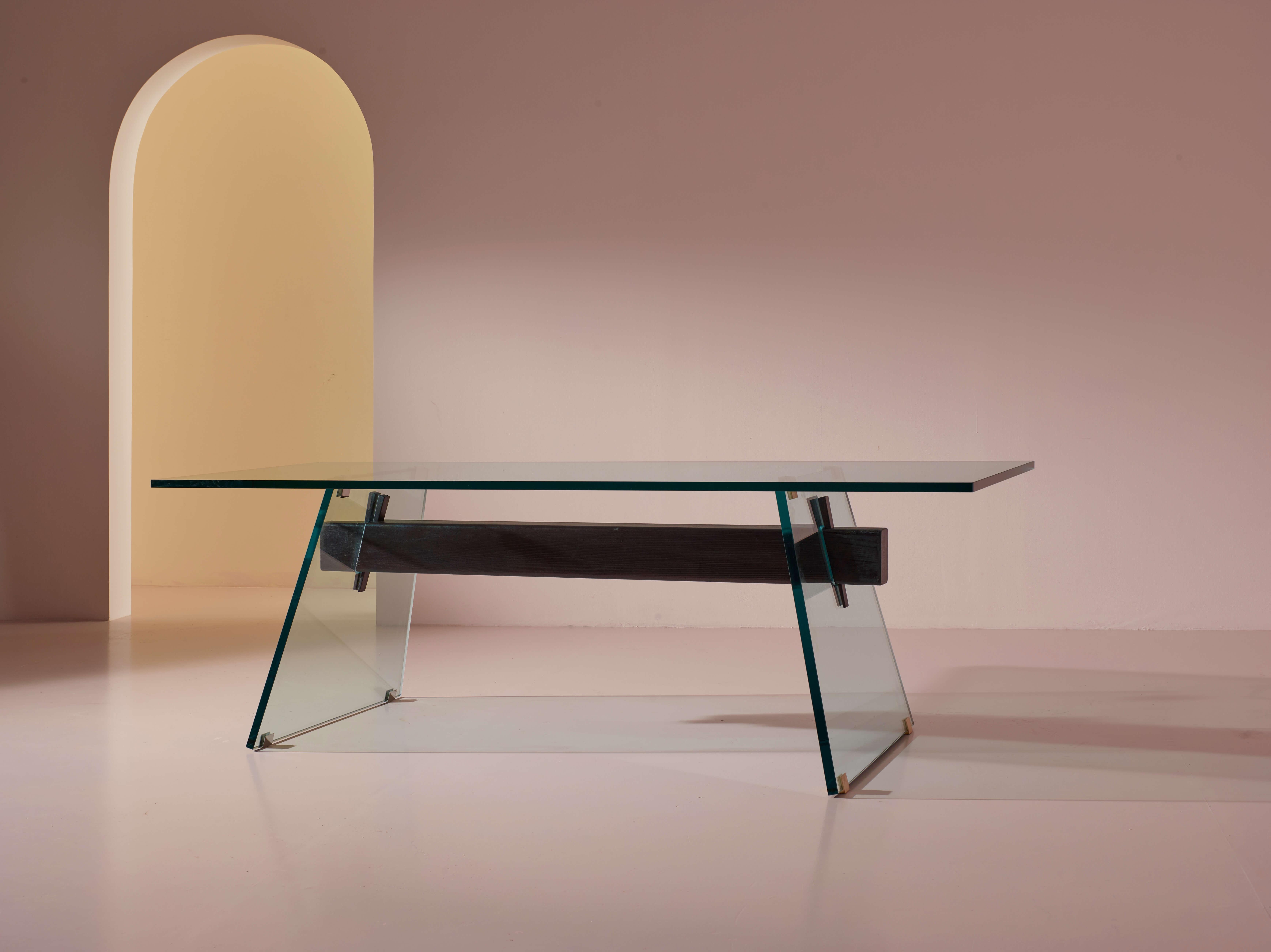 A glass, wood, and brass dining table or desk - Italian manufacture, Glas Italia prototype with certification, designed by Philippe Starck

Designing a table like this is no simple feat. Taming the character of a material as fragile and