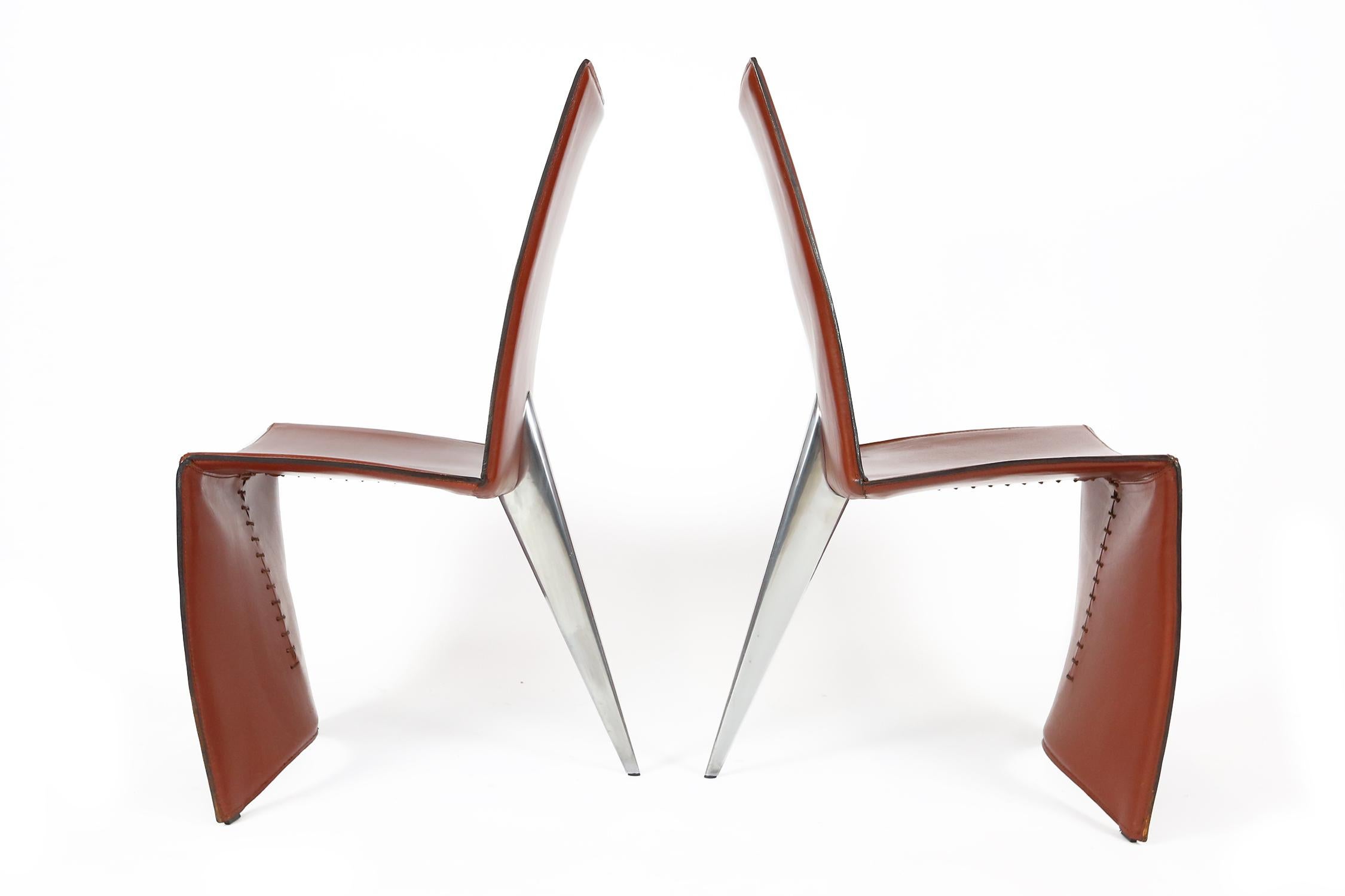 Philippe Starck, Ed Archer model chairs for Driade or Aleph. Design from 1987. Tubular steel design with red-brown calf's leather, polished cast aluminium rear leg.
Although these chairs where bought early 1990s these are pieces with minimal traces