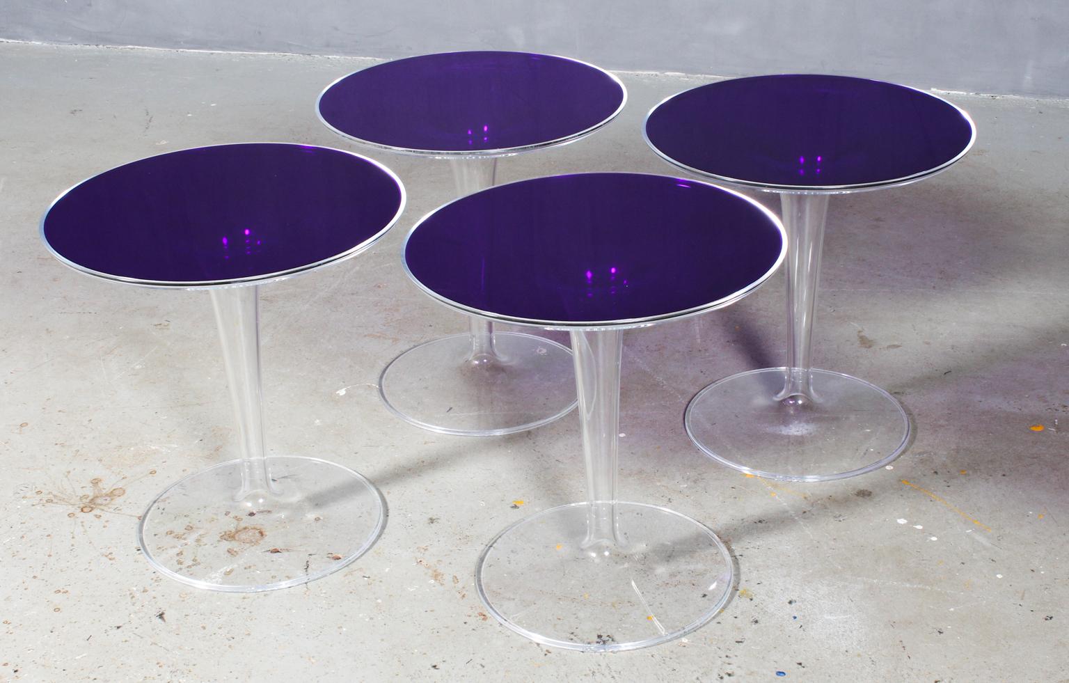 Philippe Starck & Eugeni Quitllet side tables in clear and blue or purple plast.

Model tip top, made by Kartell.