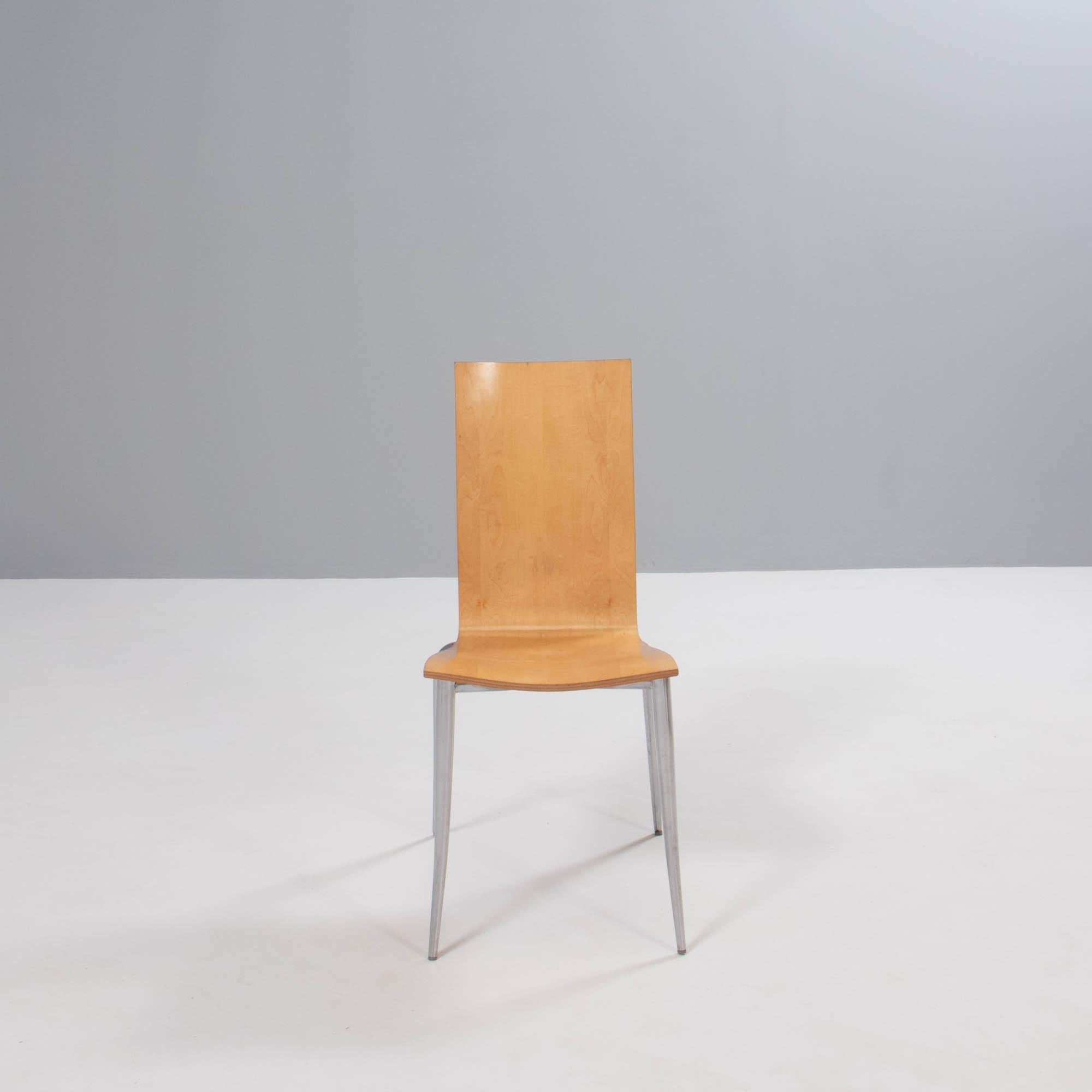 Designed by Philippe Starck for Driade, the Olly Tango dining chairs are a fantastic example of post-modernist design.

Constructed from plywood, the seats combine soft curves with sleek straight lines and sit on chromed tubular steel legs that