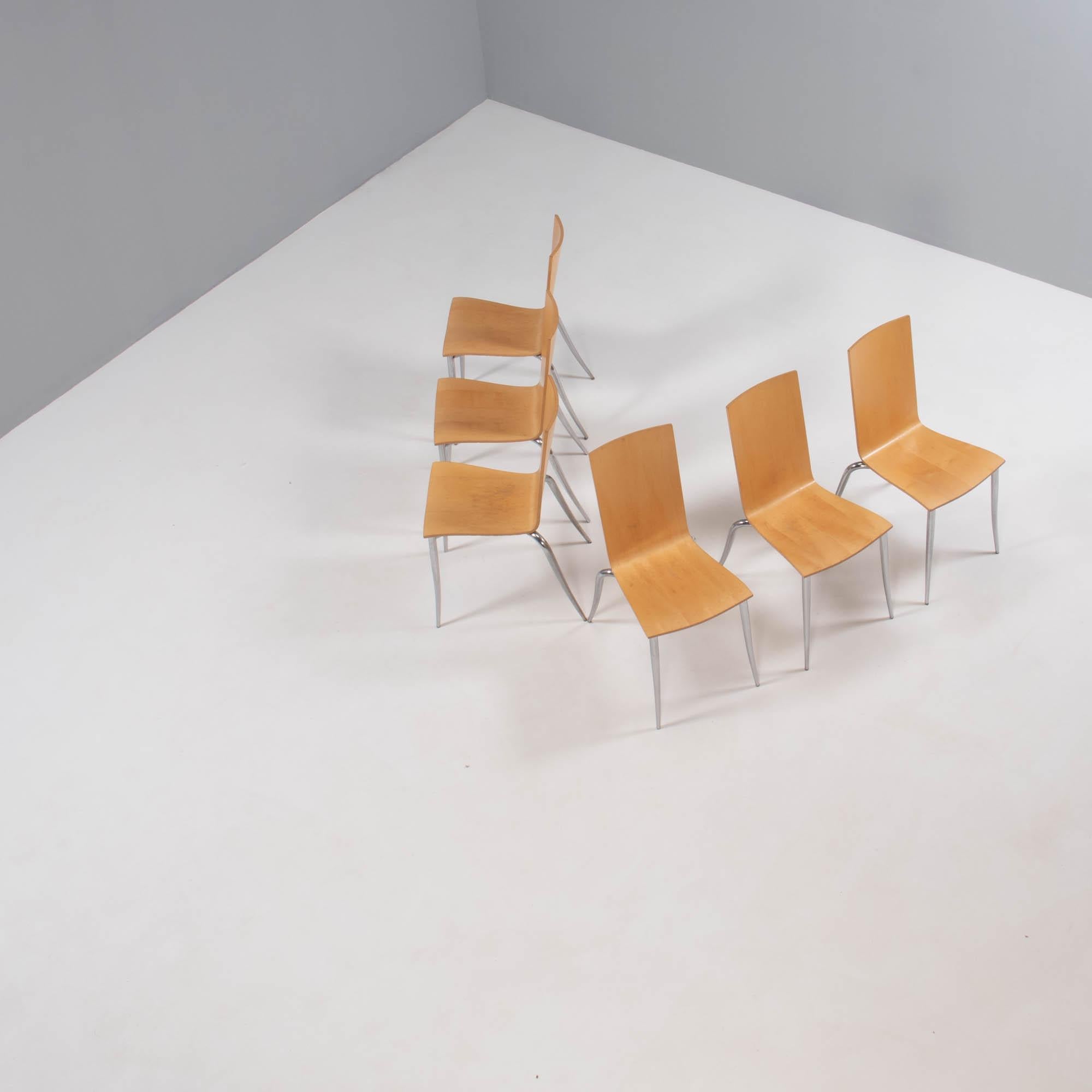 Designed by Philippe Starck for Driade, the Olly Tango dining chairs are a fantastic example of post-modernist design.

Constructed from plywood, the seats combine soft curves with sleek straight lines and sit on chromed tubular steel legs that