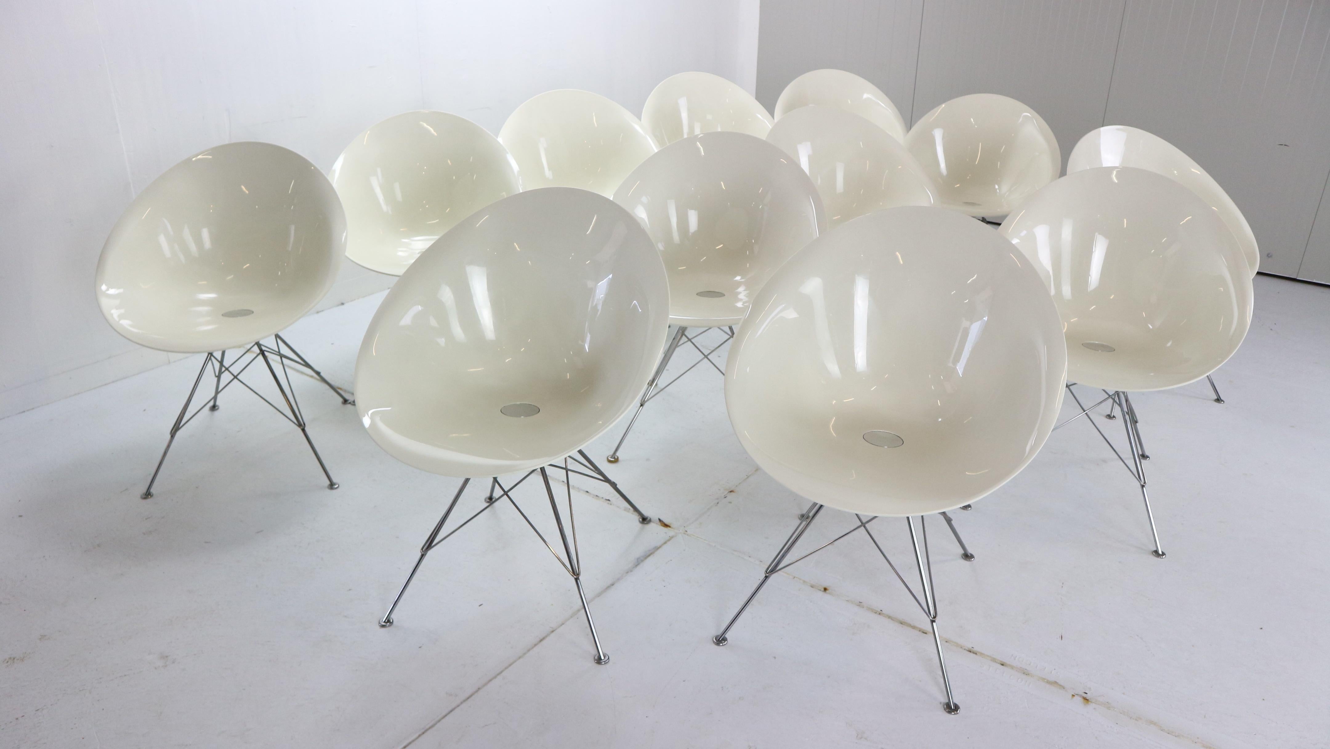 White Lucite seating and chrome wire chairs 